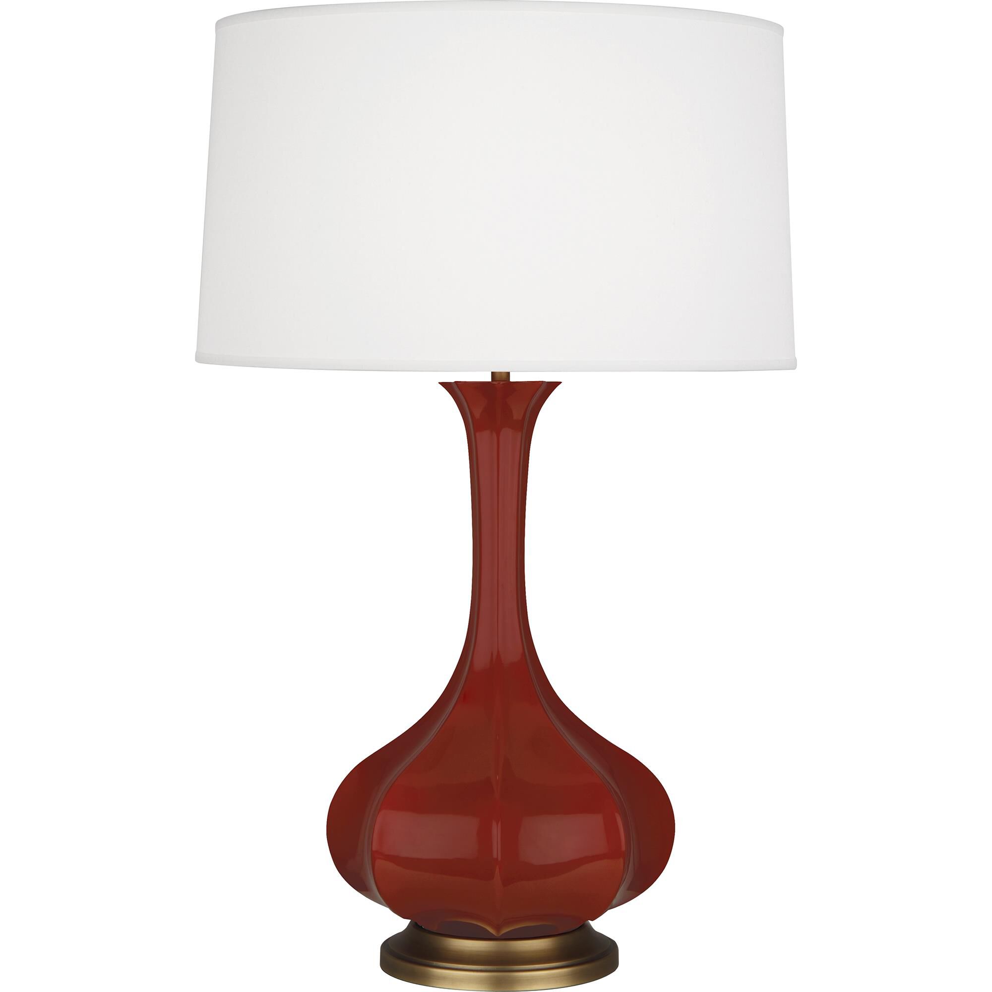 Shown in Oxblood Glazed Ceramic With Aged Brass Accents finish and Pearl Dupoini Fabric shade