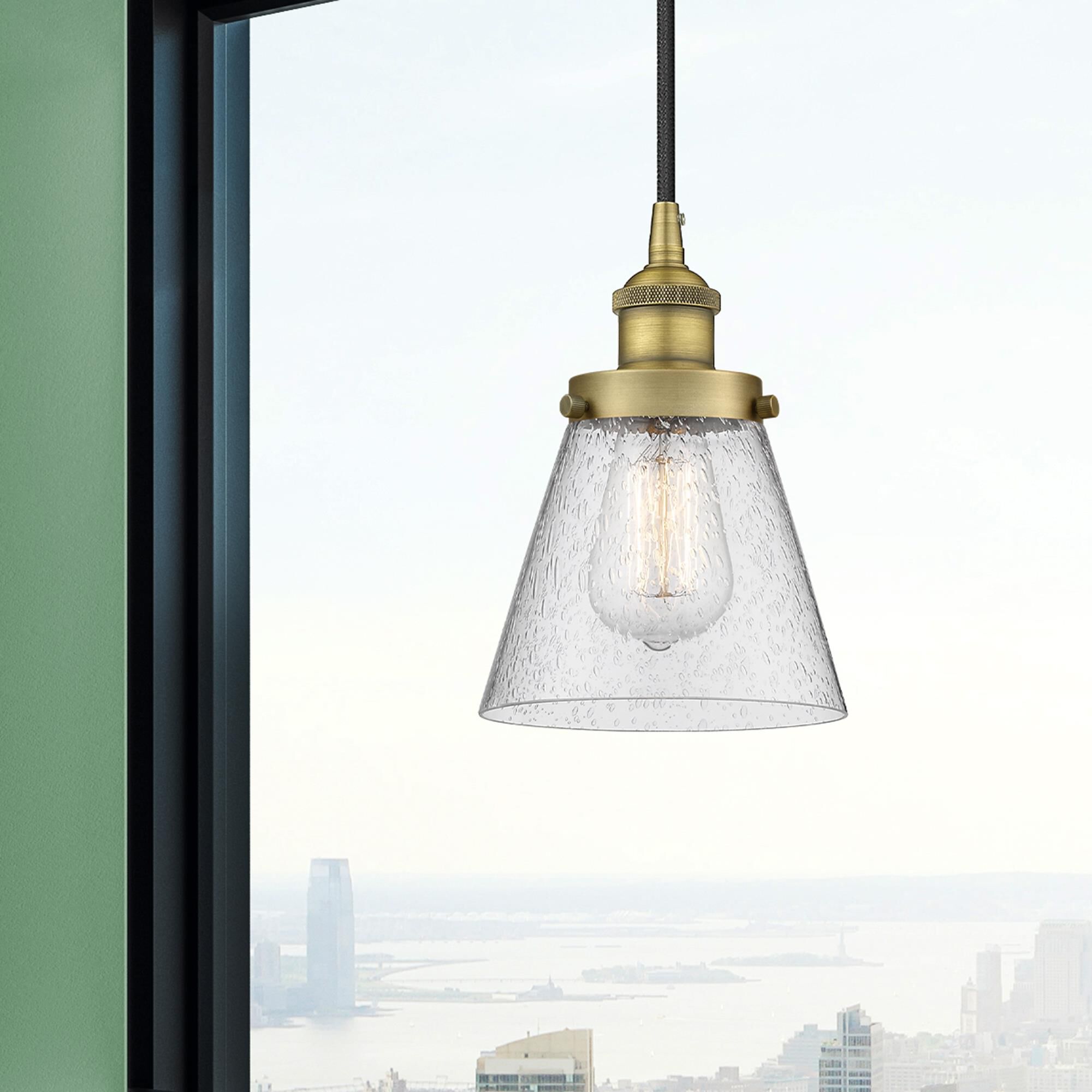 Shown in Brushed Brass finish and Seedy Small Cone glass