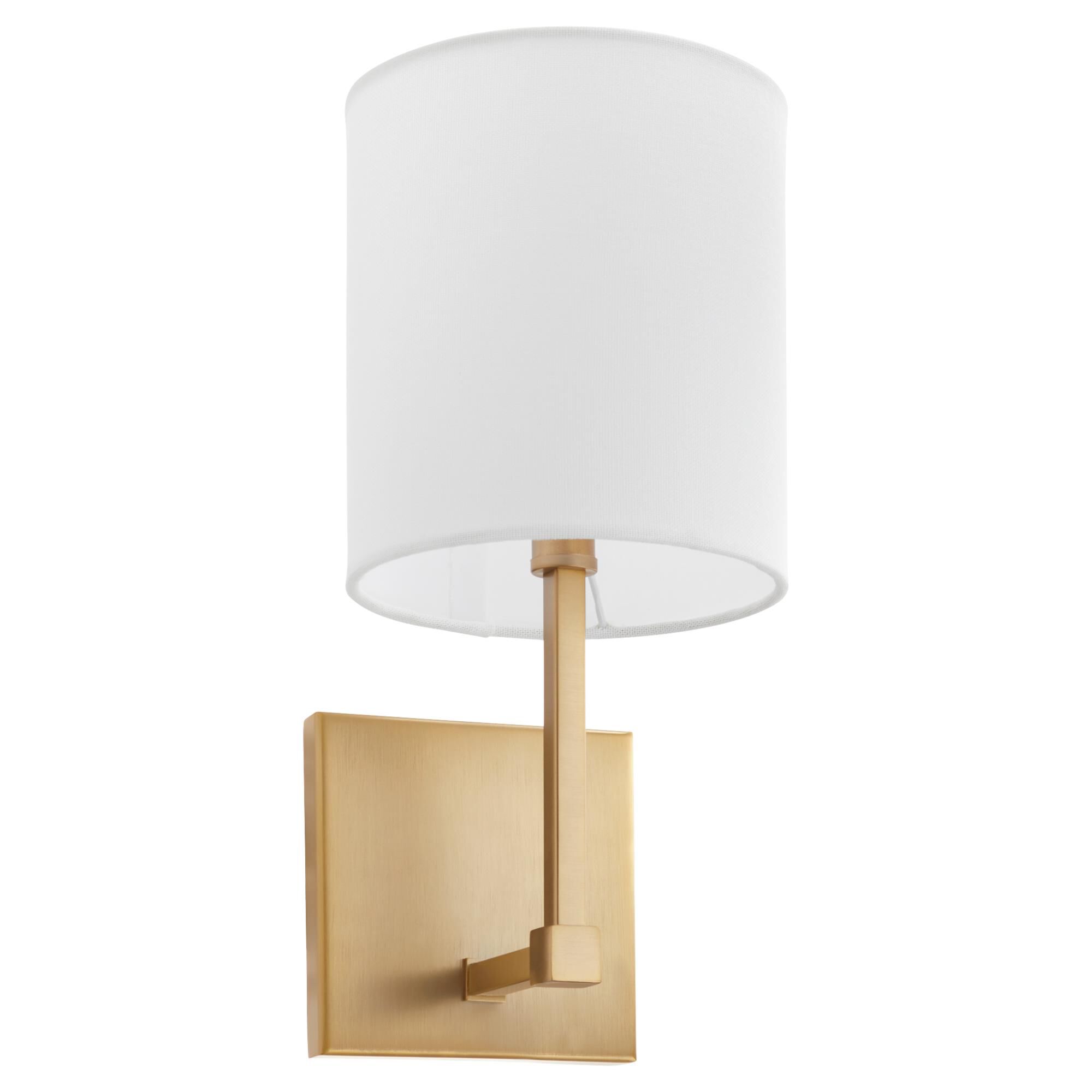 Shown in Aged Brass finish and White Linen shade