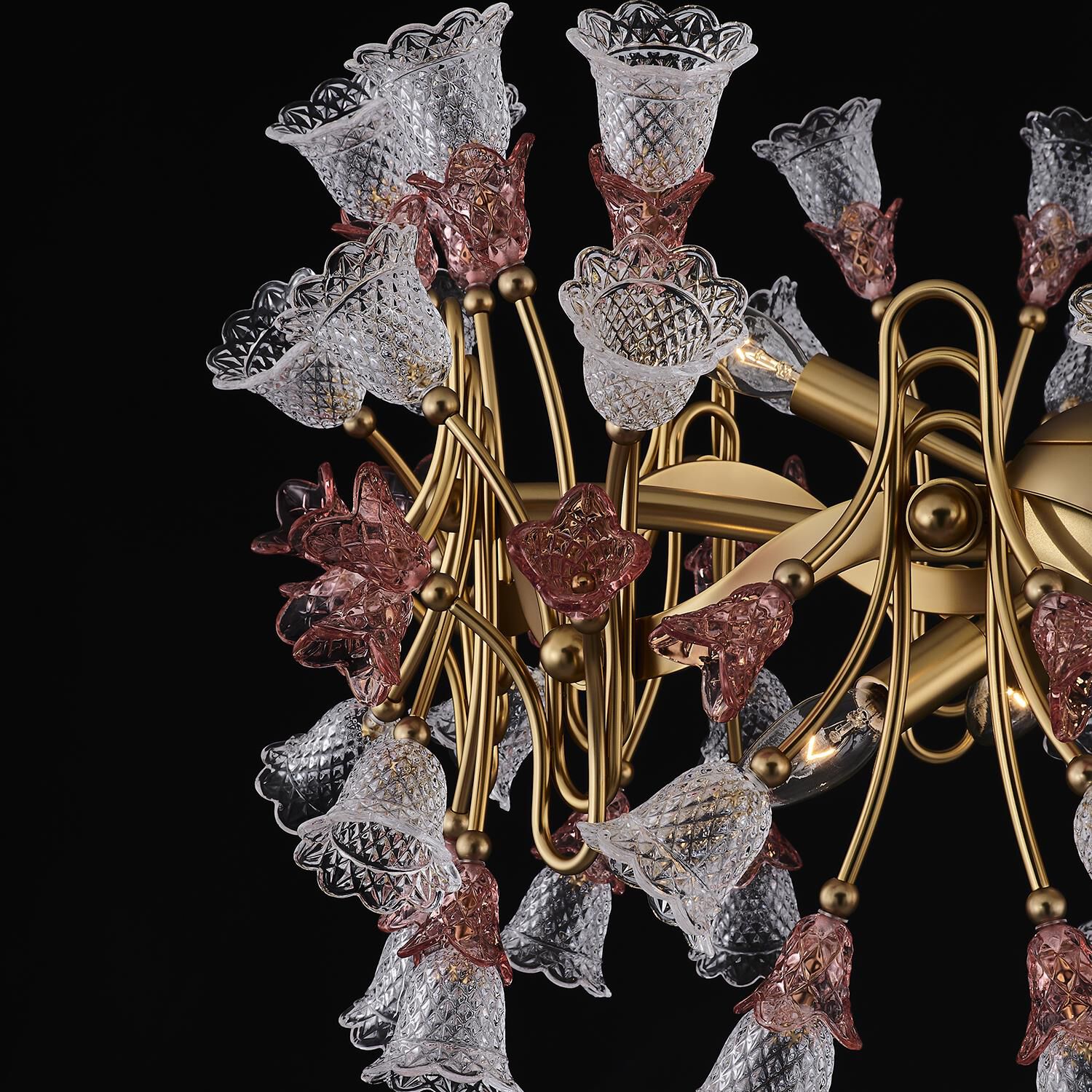 Shown in Antique Brass finish and Vintage Rose crystal