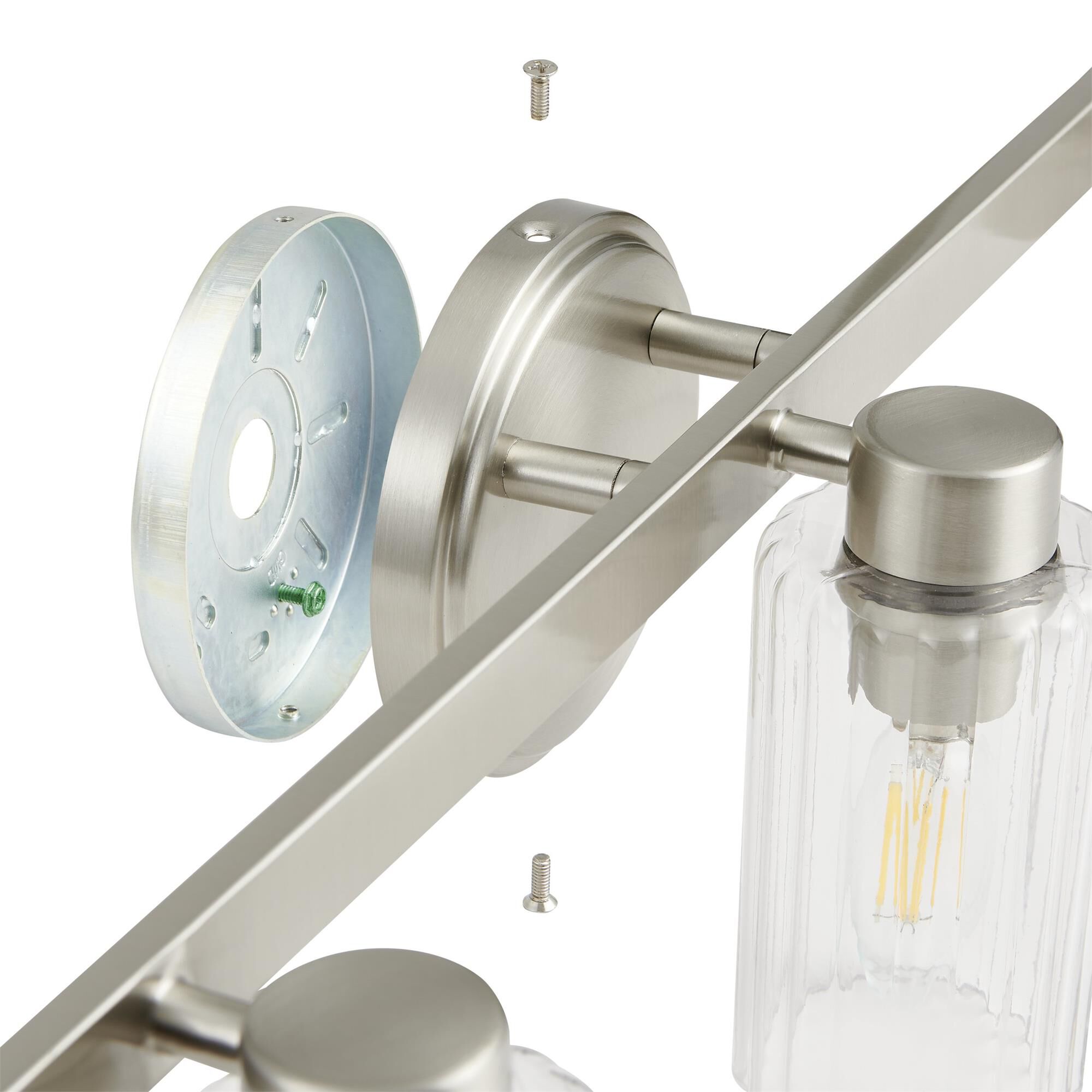 Shown in Brushed Nickel finish and Clear Ribbed glass