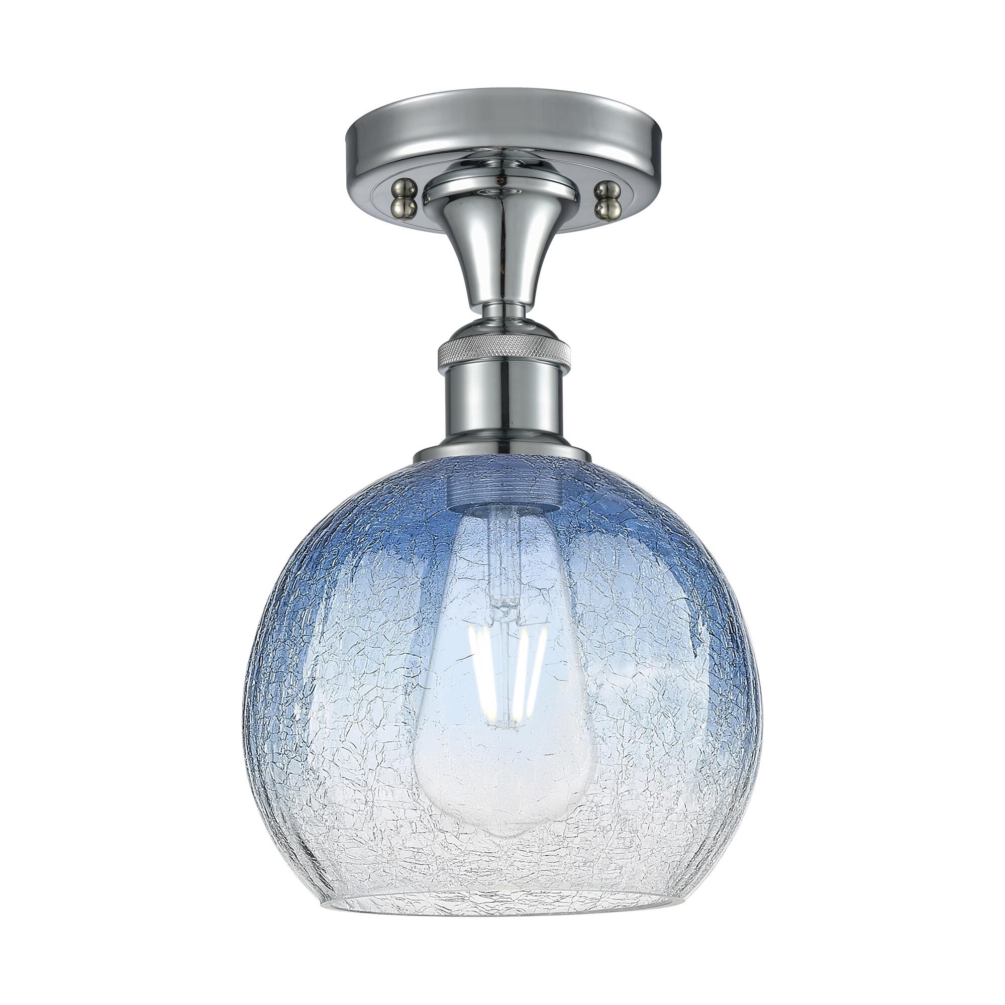 Shown in Polished Chrome finish and Sapphire Blue glass