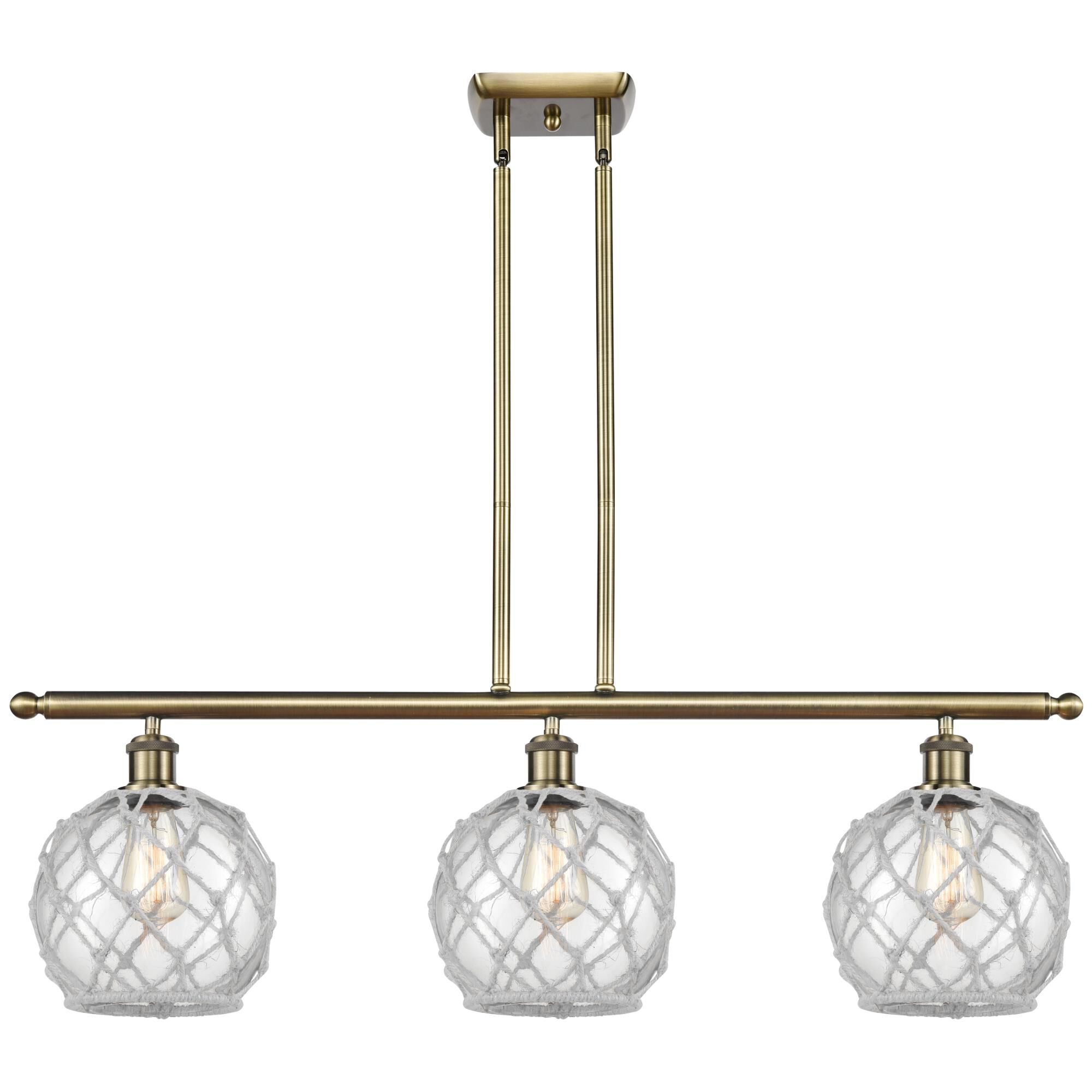 Shown in Antique Brass finish and Clear with White Rope glass