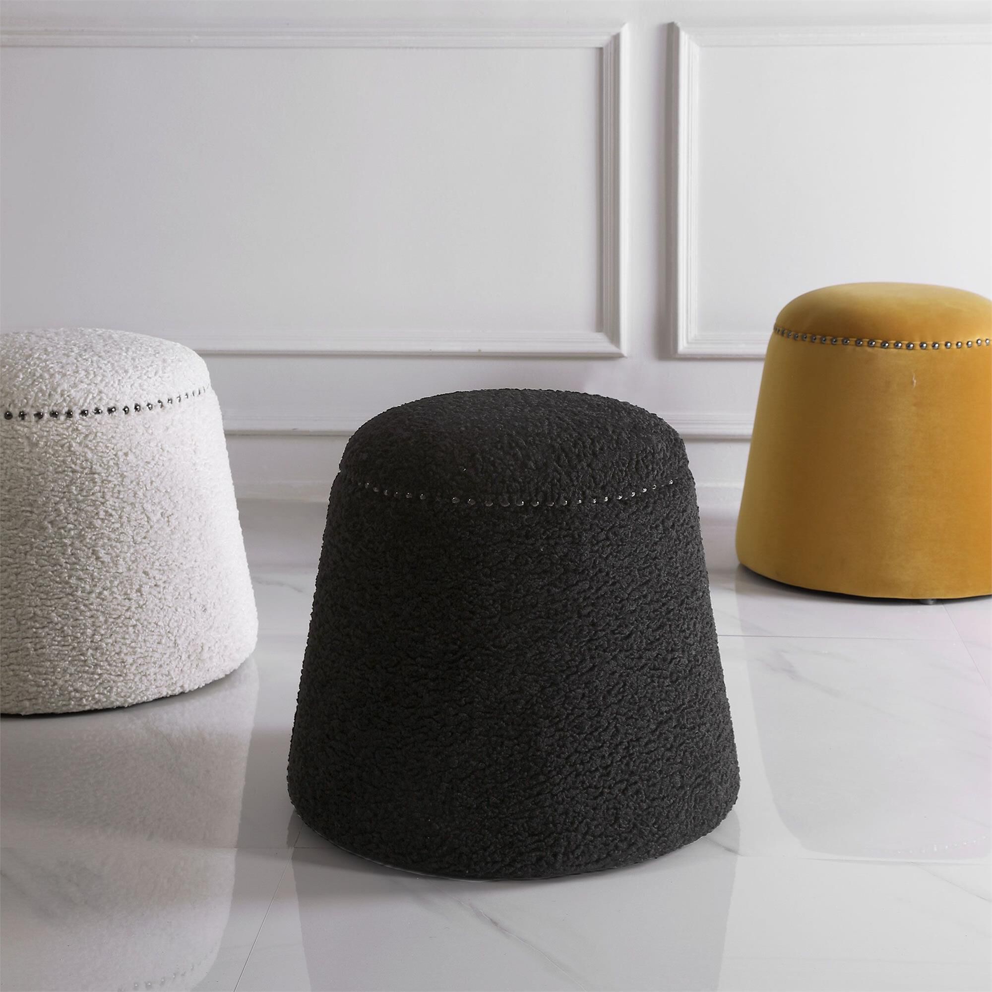 Shown in This Plush Ottoman Is Covered In A Luxurious Faux Black Shearling With Black Nickel Nail Head Detail finish