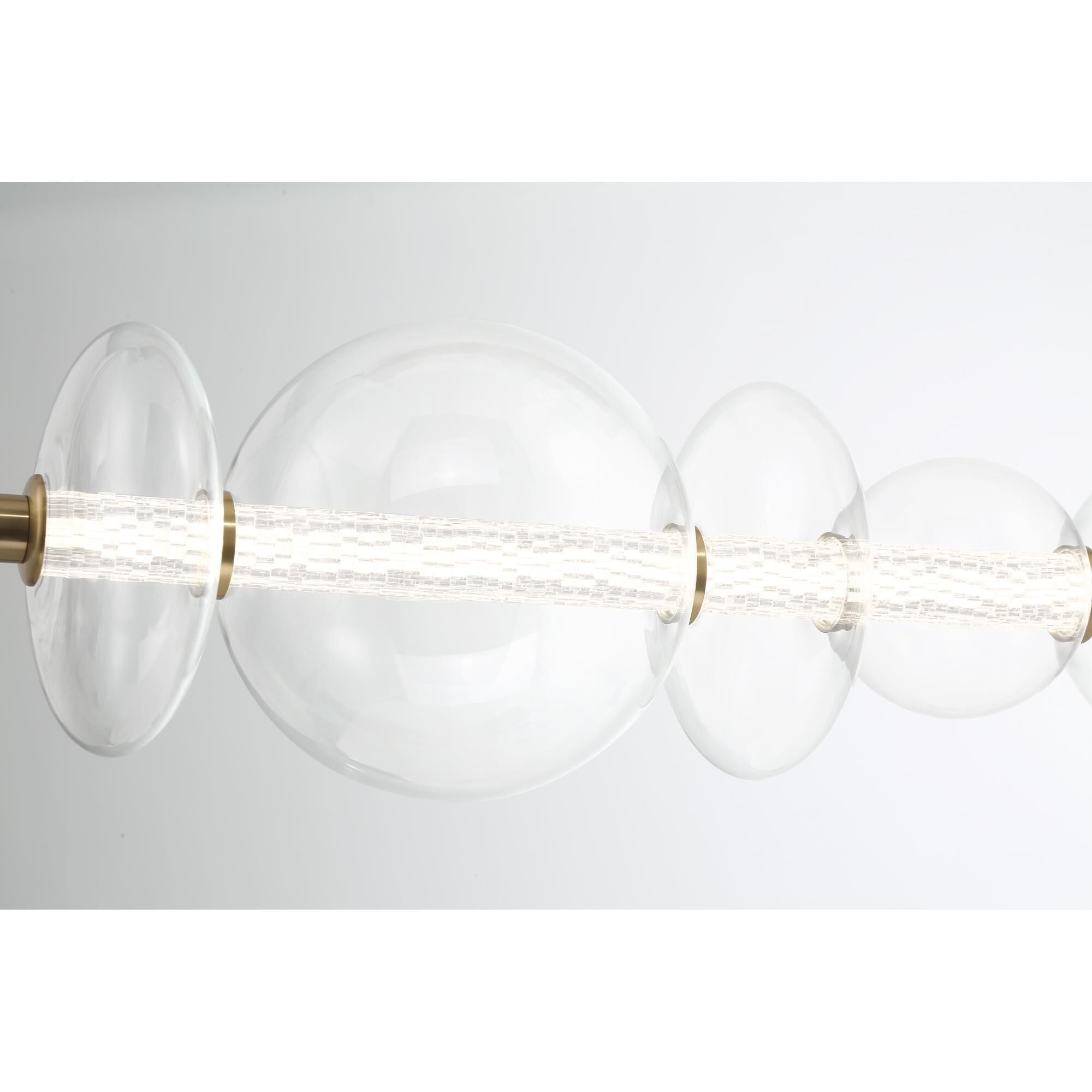 Shown in Gold finish and Clear glass