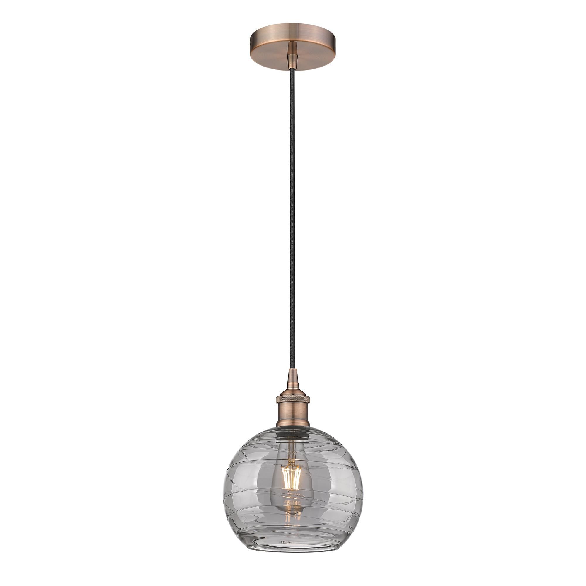 Shown in Antique Copper finish and Light Smoke Deco Swirl glass