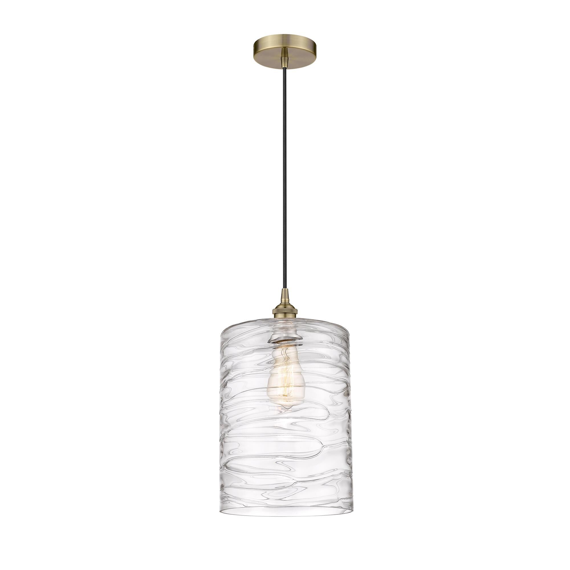 Shown in Antique Brass finish and Deco Swirl glass