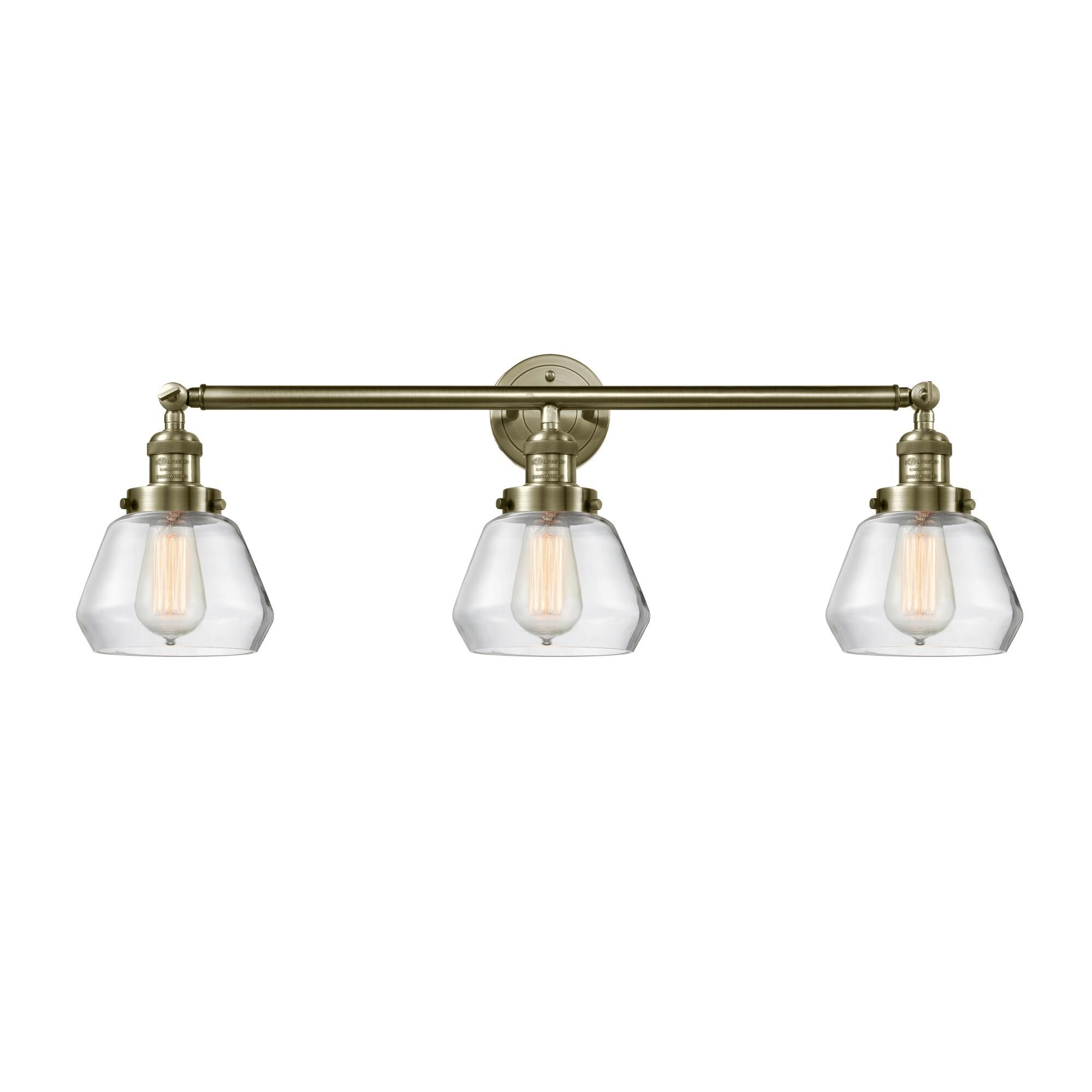 Shown in Antique Brass finish and Clear glass
