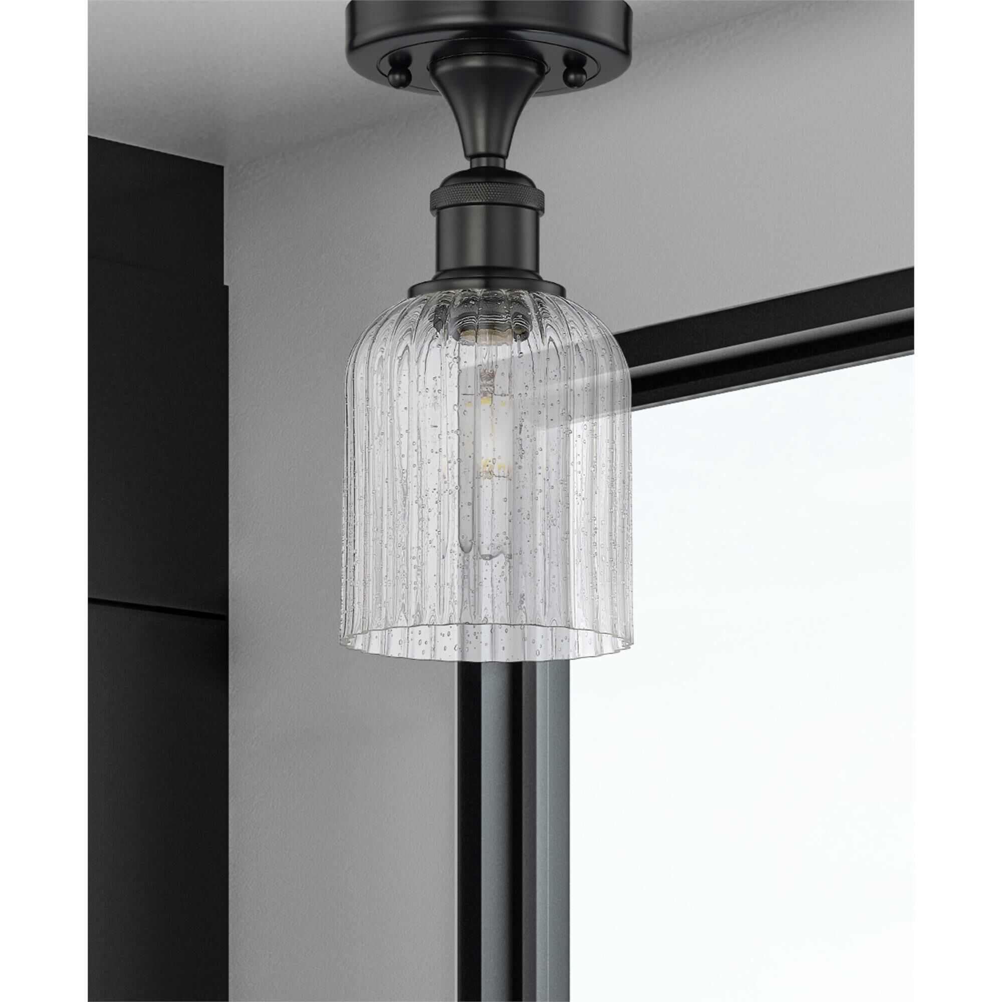 Shown in Matte Black finish and Seedy glass