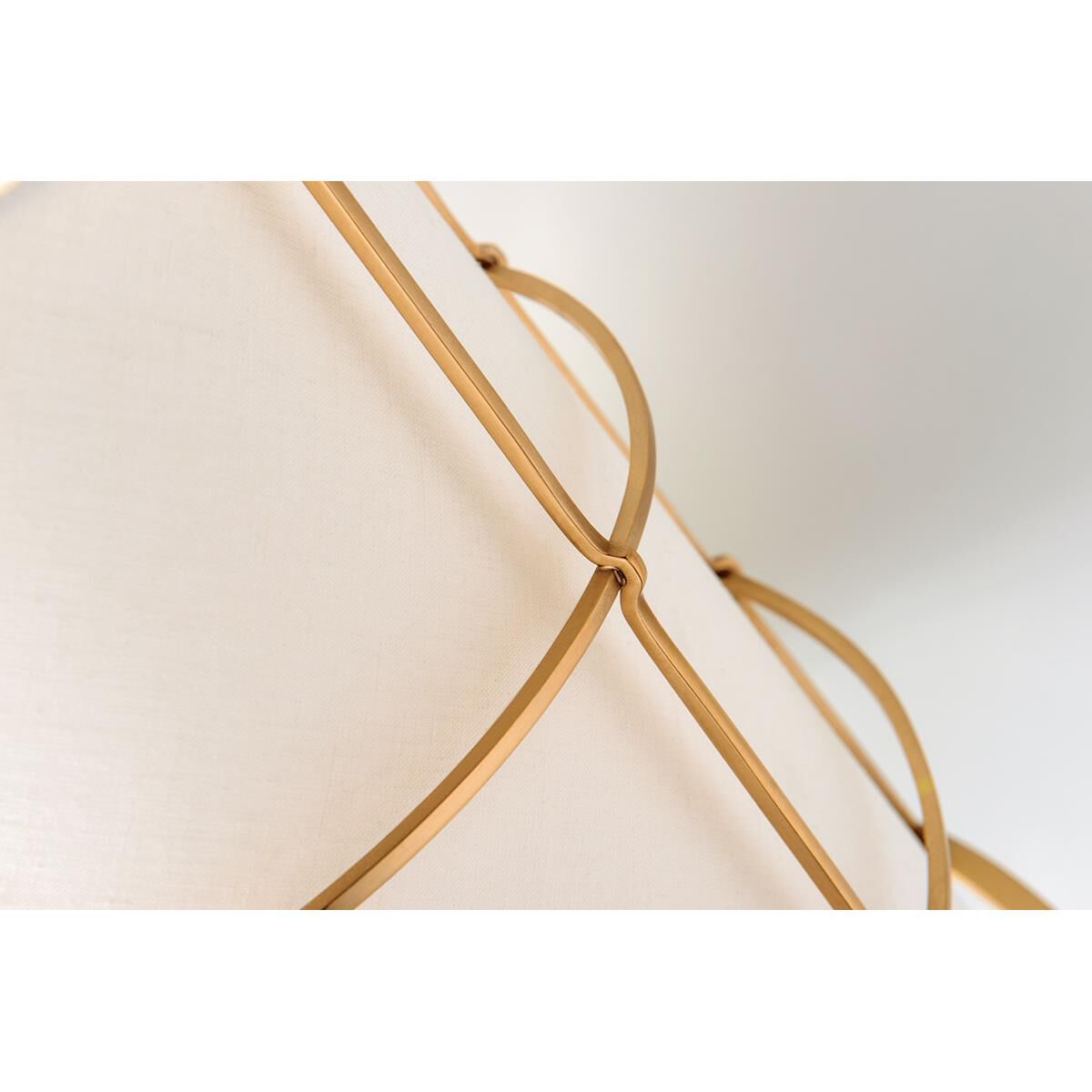 Shown in Aged Brass finish and Linen shade