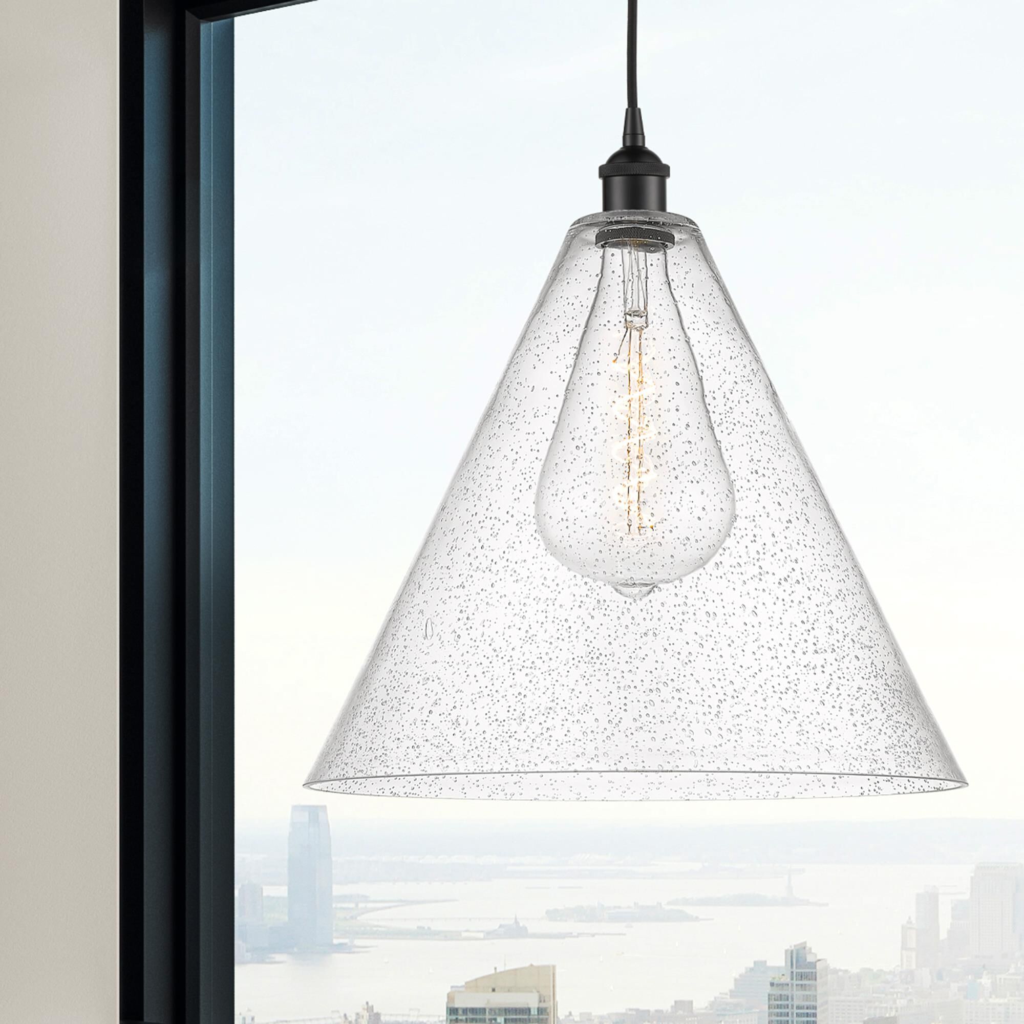 Shown in Matte Black finish and Seedy glass
