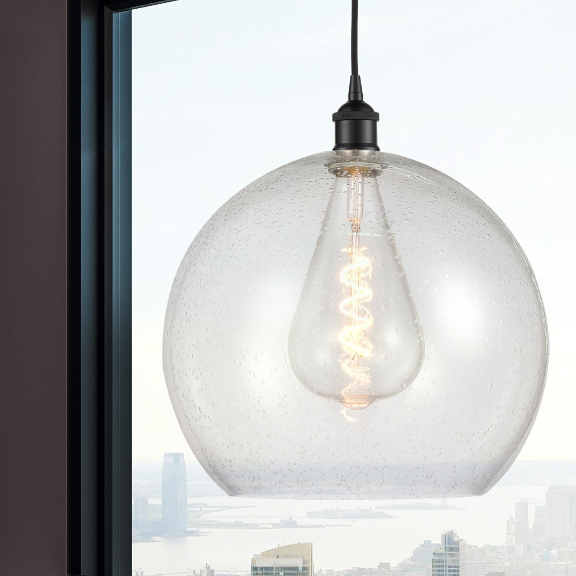 Shown in Matte Black finish and Seedy glass