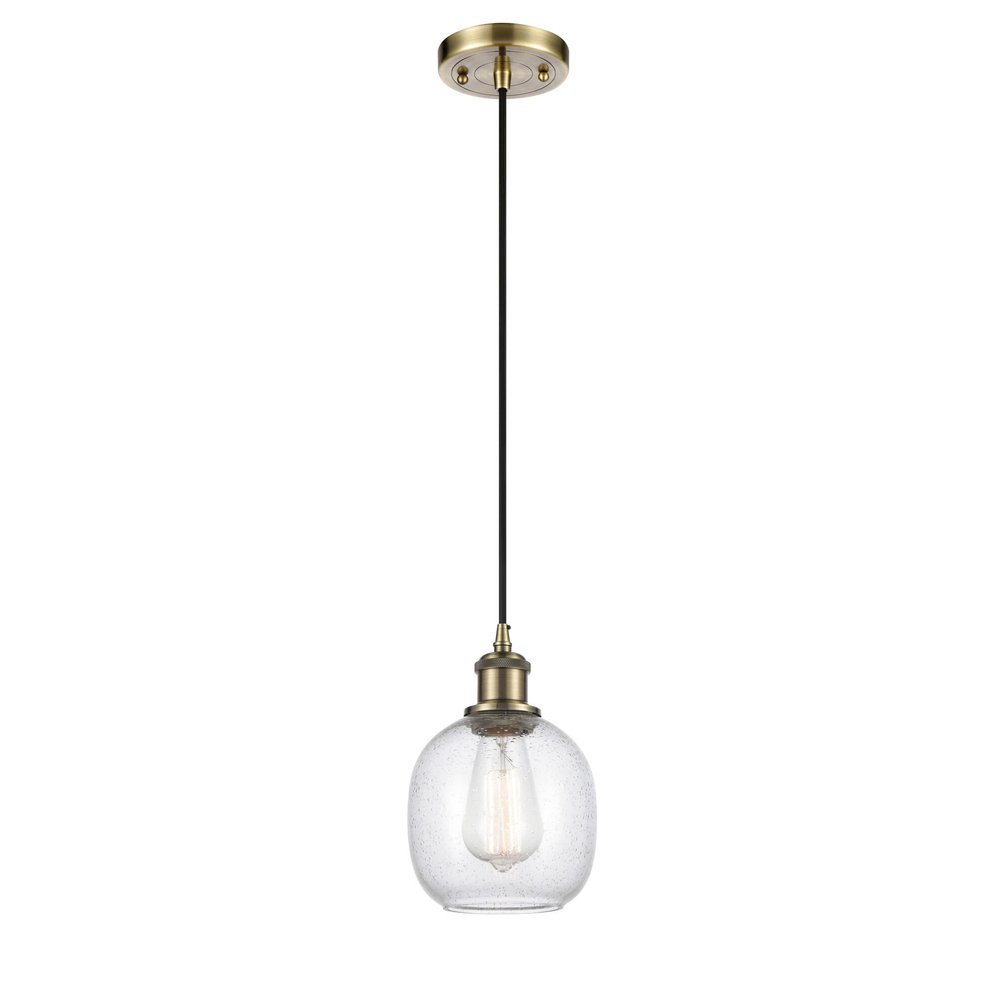 Shown in Antique Brass finish and Sphere glass and Glass shade