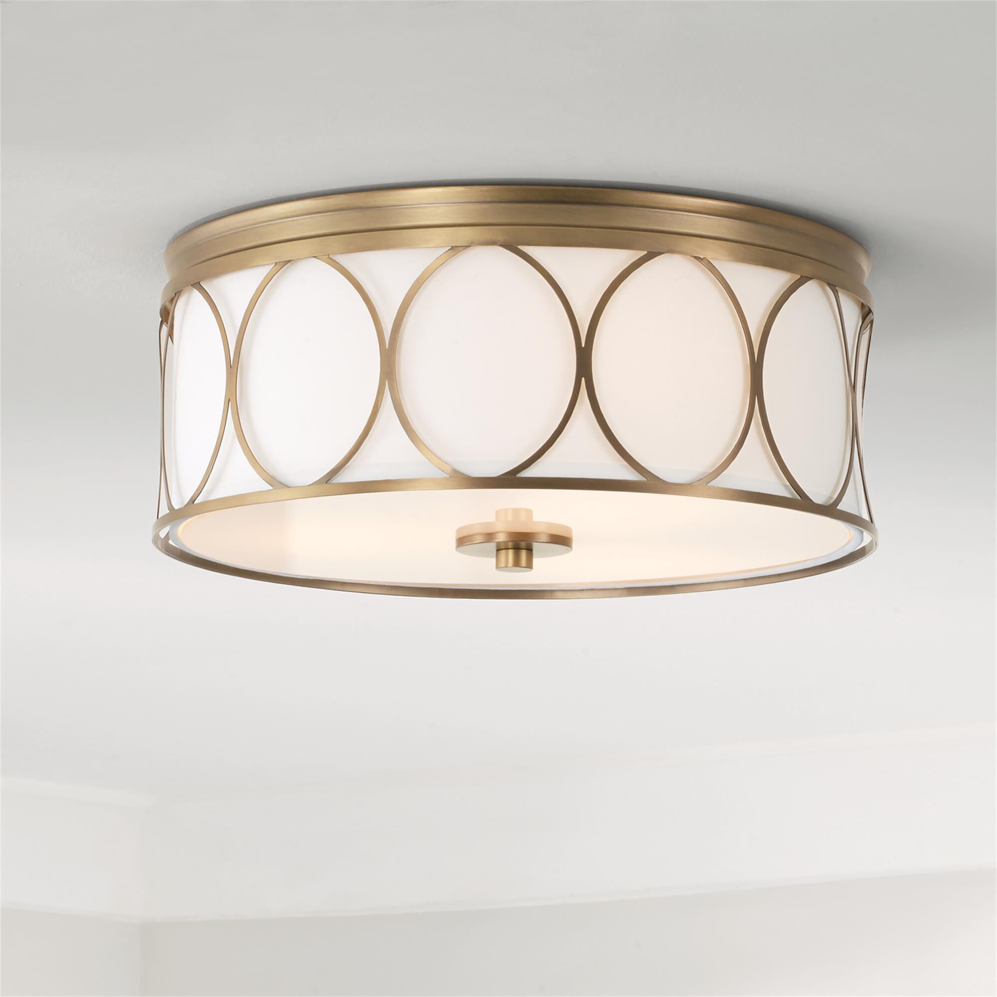 Shown in Aged Brass finish and White Fabric Bolt-On shade