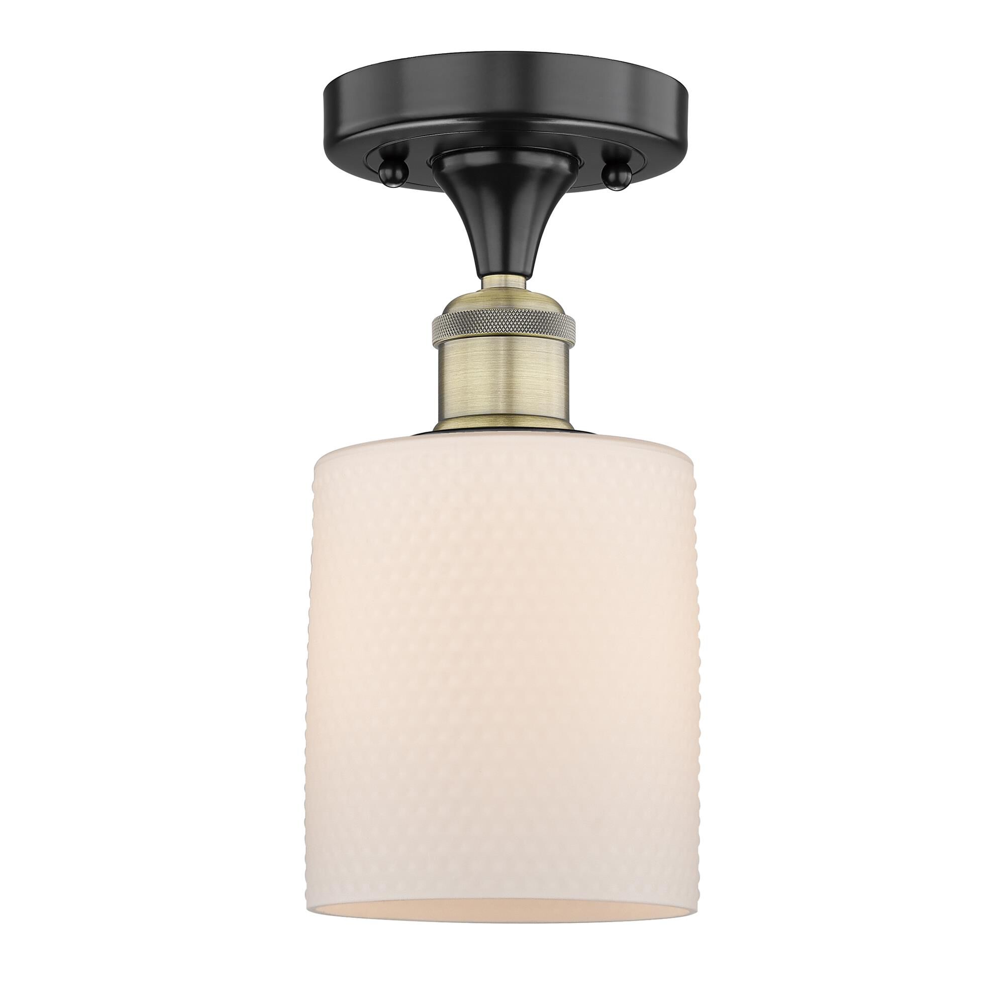 Shown in Black Antique Brass finish and Matte White glass