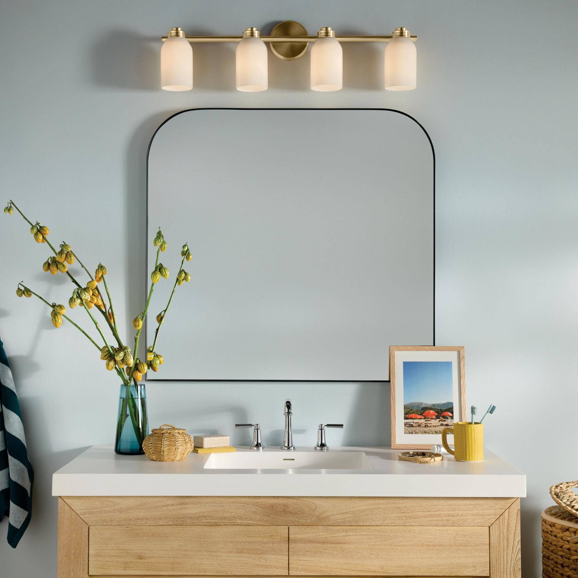 Shown in Champagne Bronze finish and Opal glass