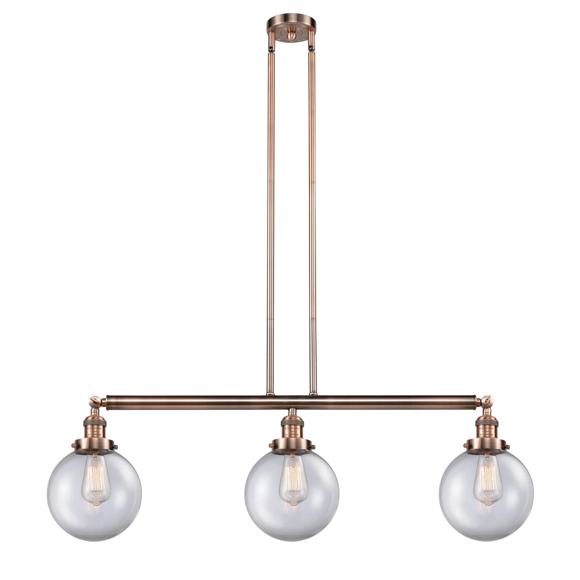 Shown in Antique Copper finish and Clear Beacon glass