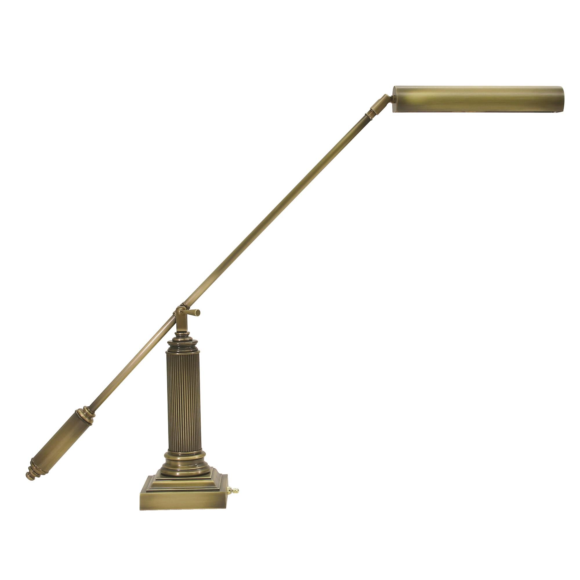 Shown in Antique Brass finish and Metal shade
