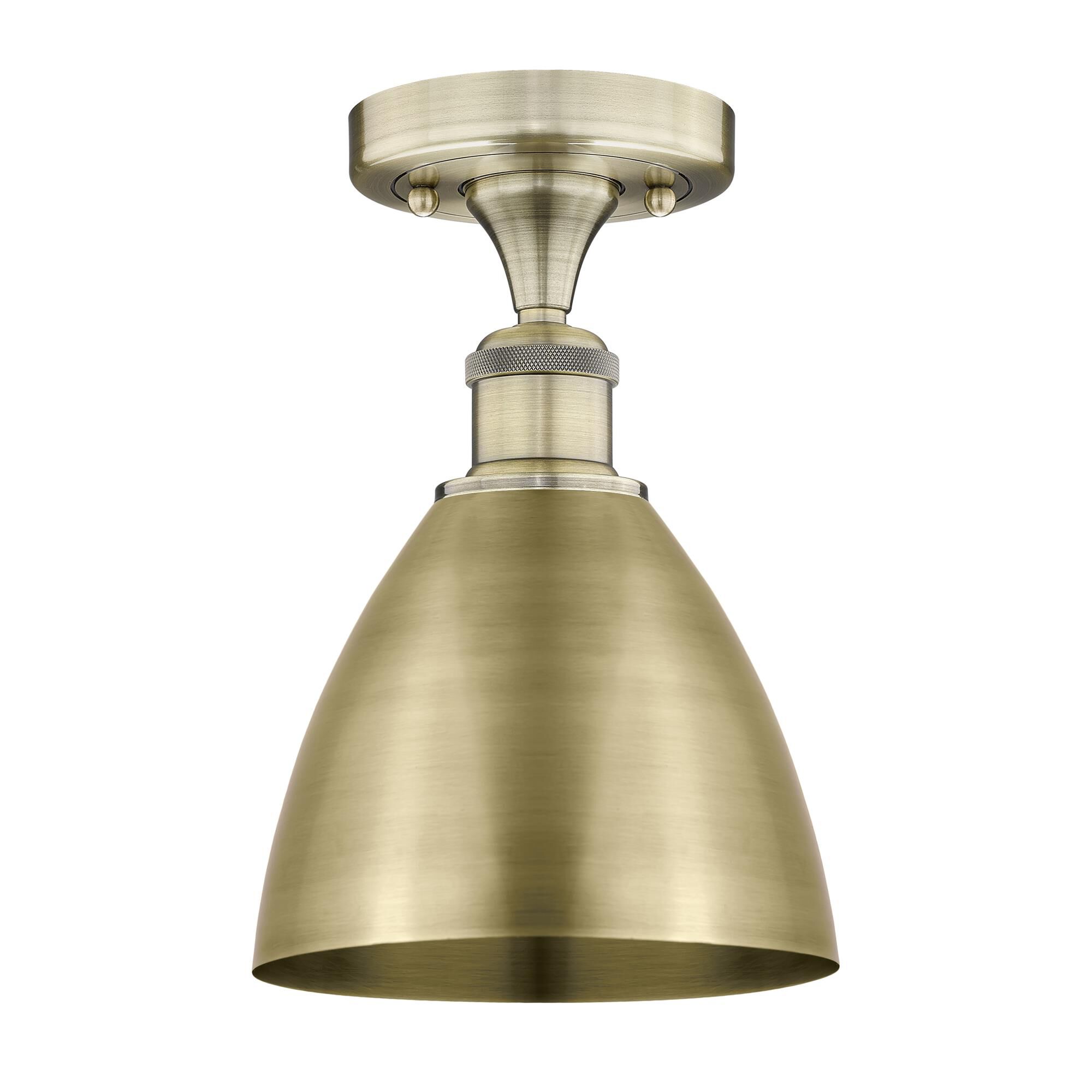 Shown in Antique Brass finish and Antique Brass shade