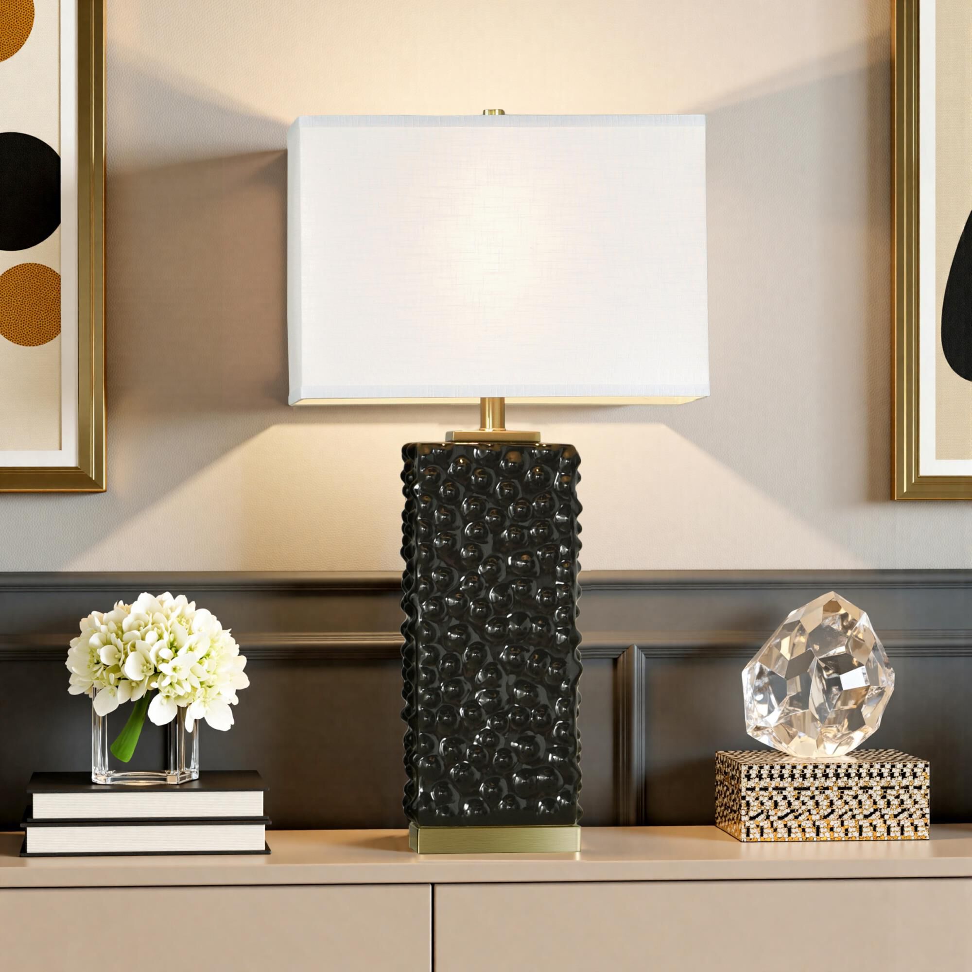Shown in Polished Brass and Glossy Black finish and Off-White shade