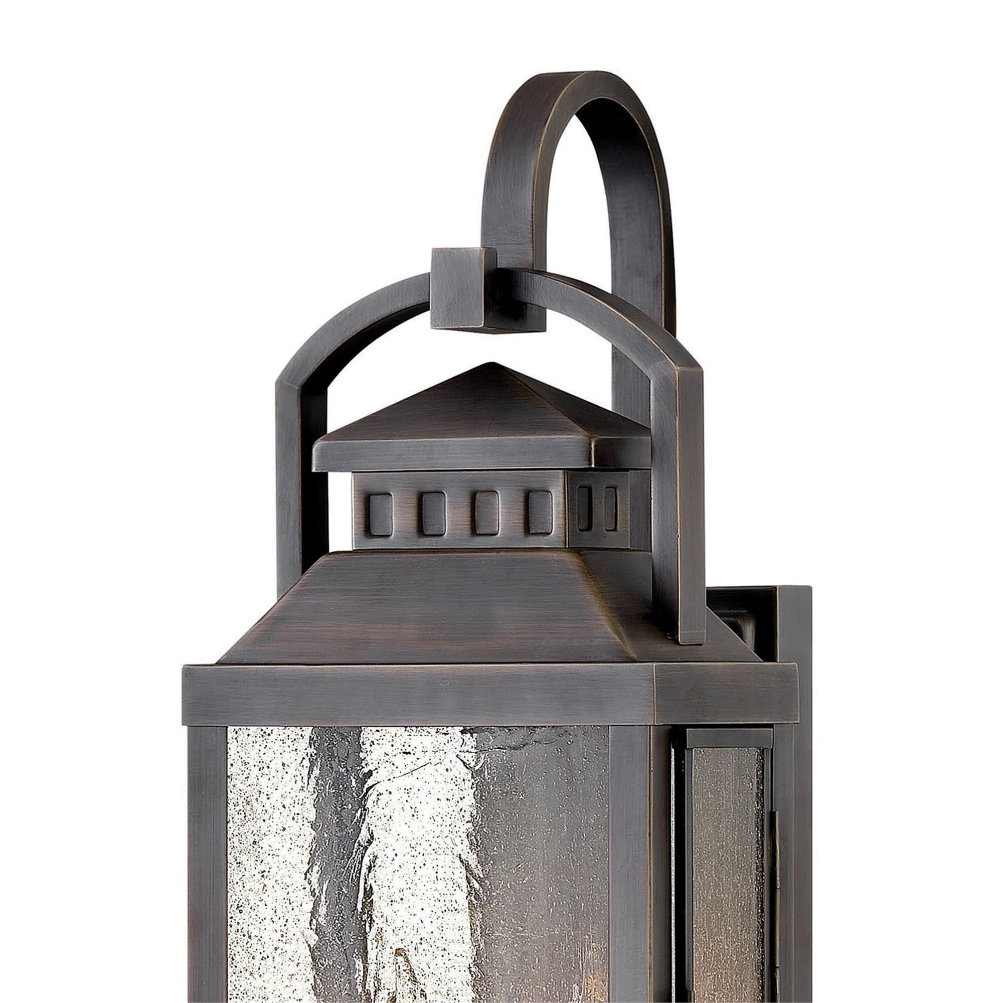 Shown in Blackened Brass finish and Clear Seedy glass