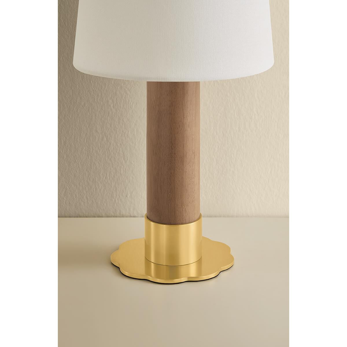 Shown in Aged Brass finish and White Linen shade
