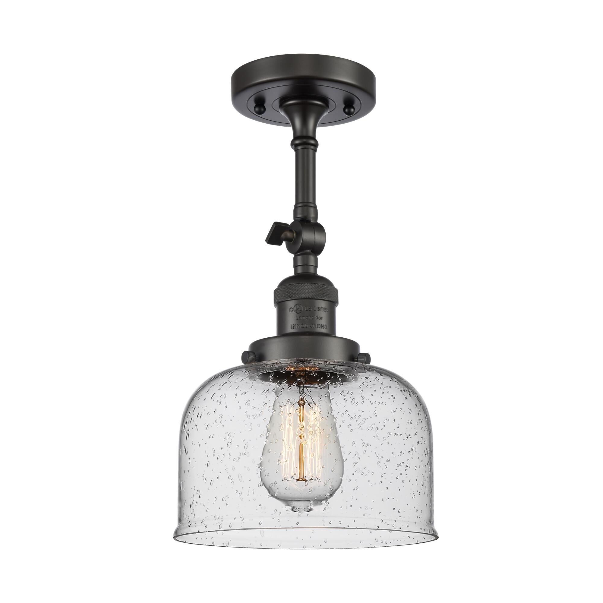 Shown in Oil Rubbed Bronze finish and Seedy glass