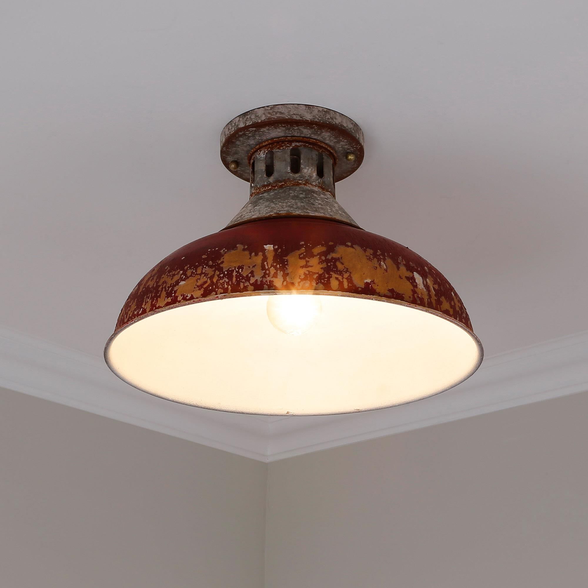 Shown in Aged Galvanized Steel finish and Red shade