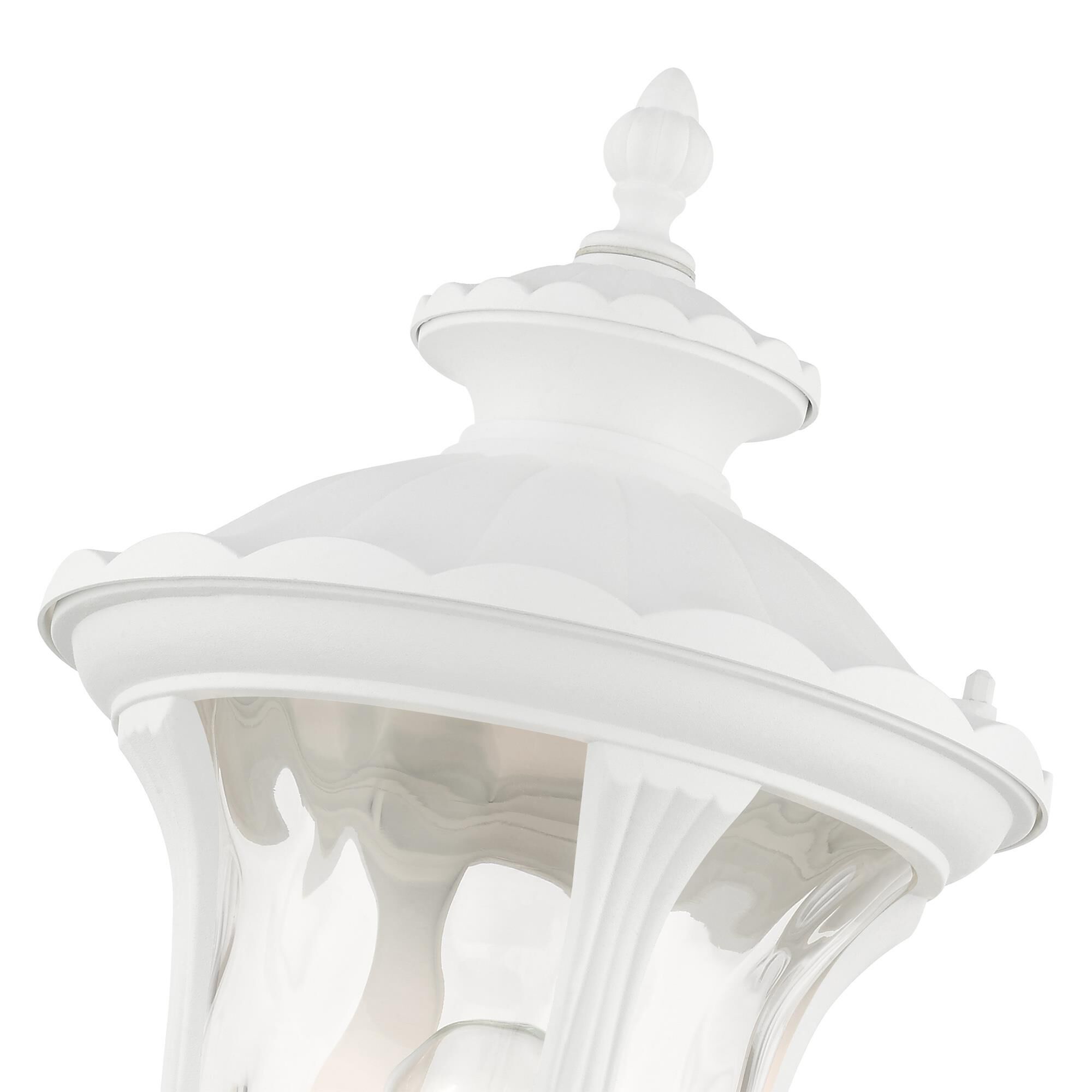 Shown in Textured White finish and Hand Blown Clear Water glass and Hand Blown Clear Water Glass shade