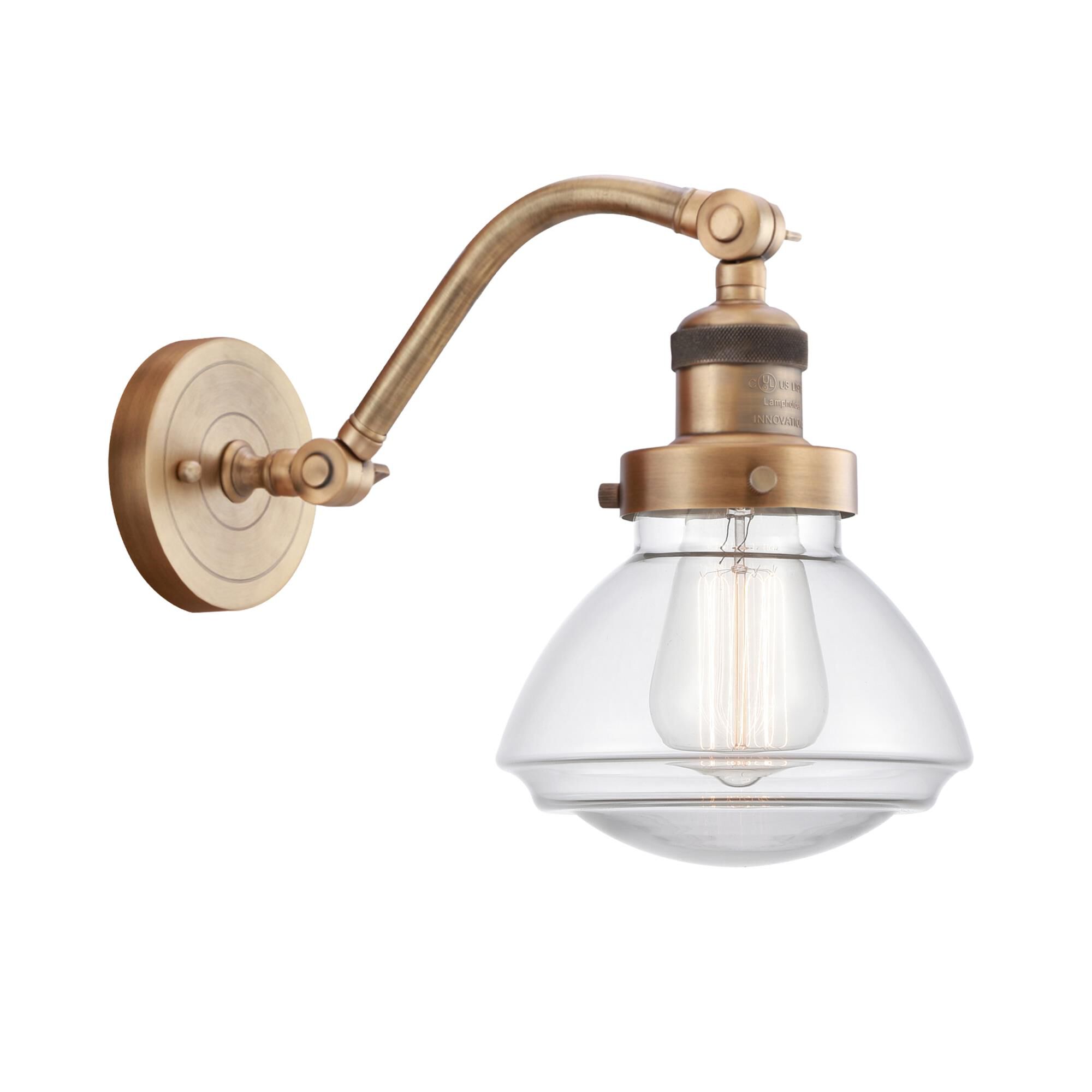 Shown in Brushed Brass finish and Clear Olean glass