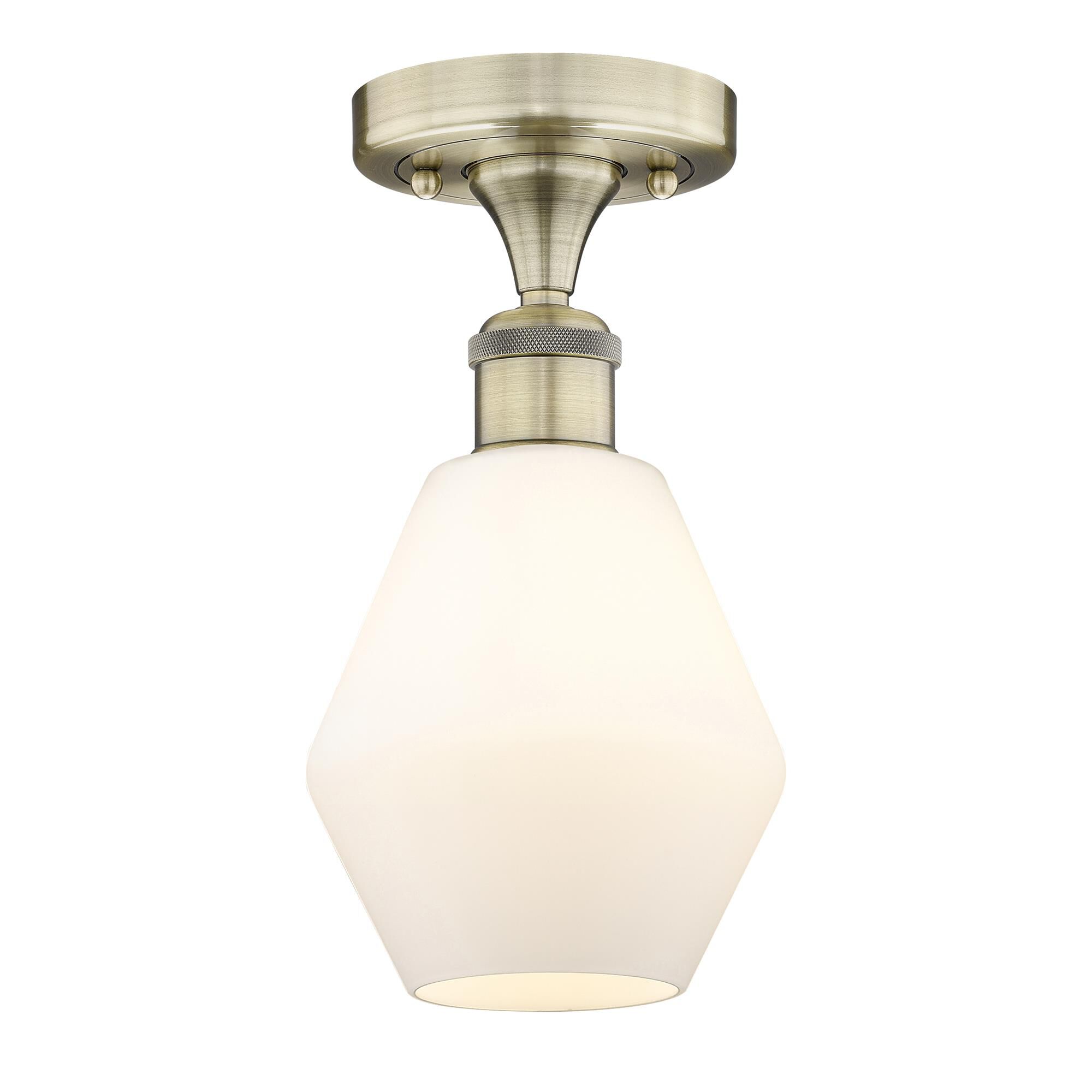 Shown in Antique Brass finish and Cased Matte White glass