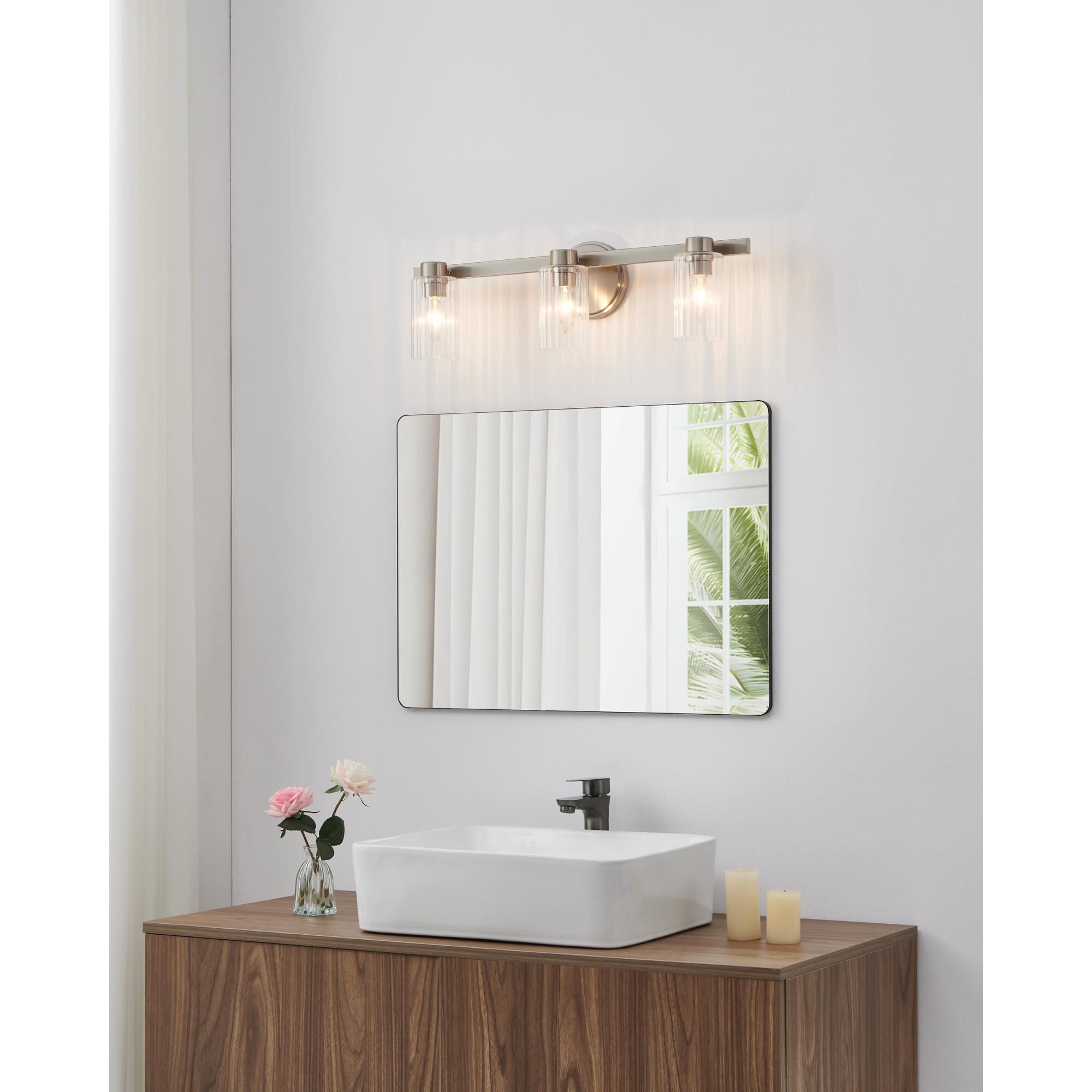 Shown in Brushed Nickel finish and Clear Ribbed glass