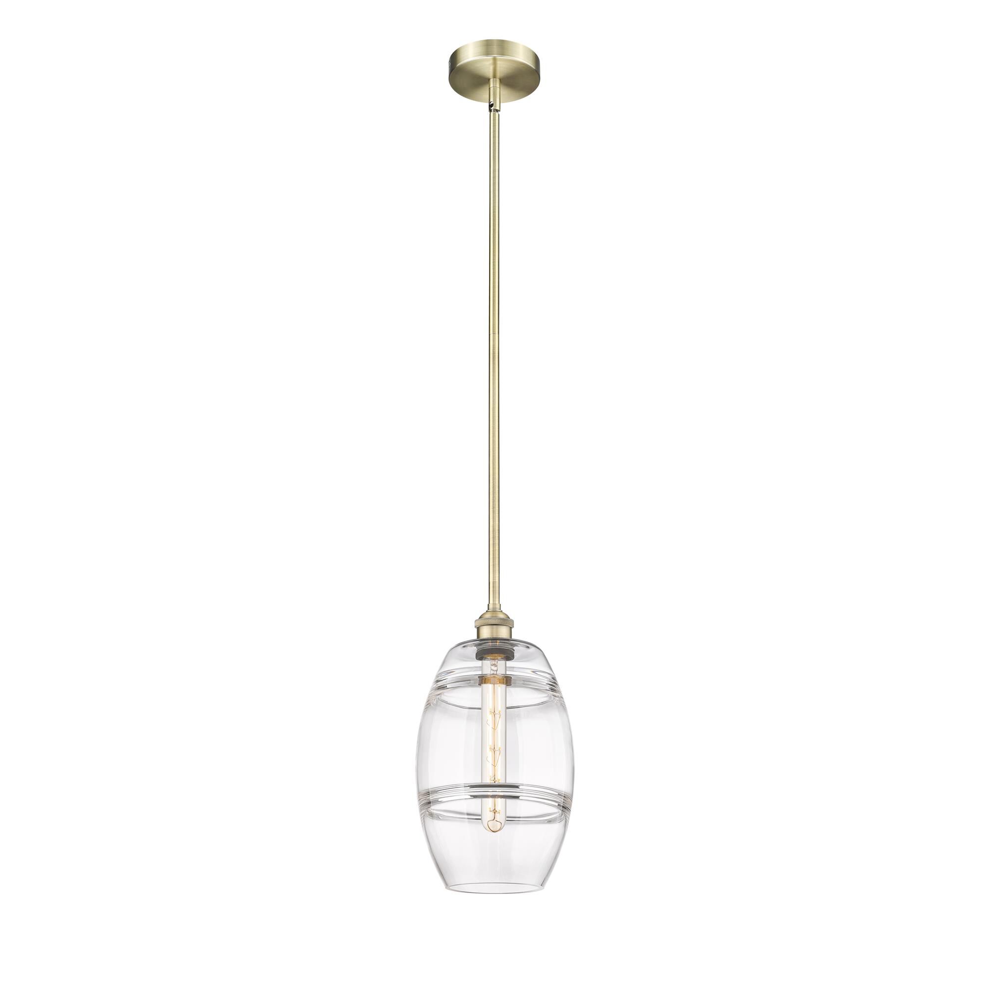 Shown in Antique Brass finish and Clear glass