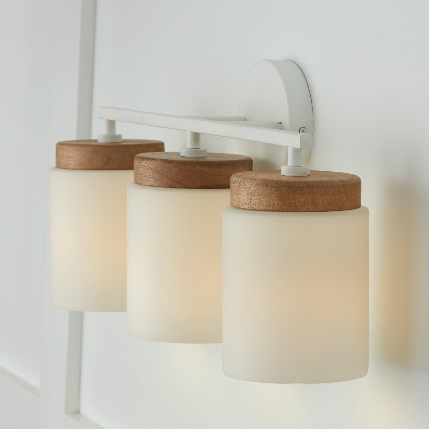 Shown in Light Wood And White finish and Soft White glass