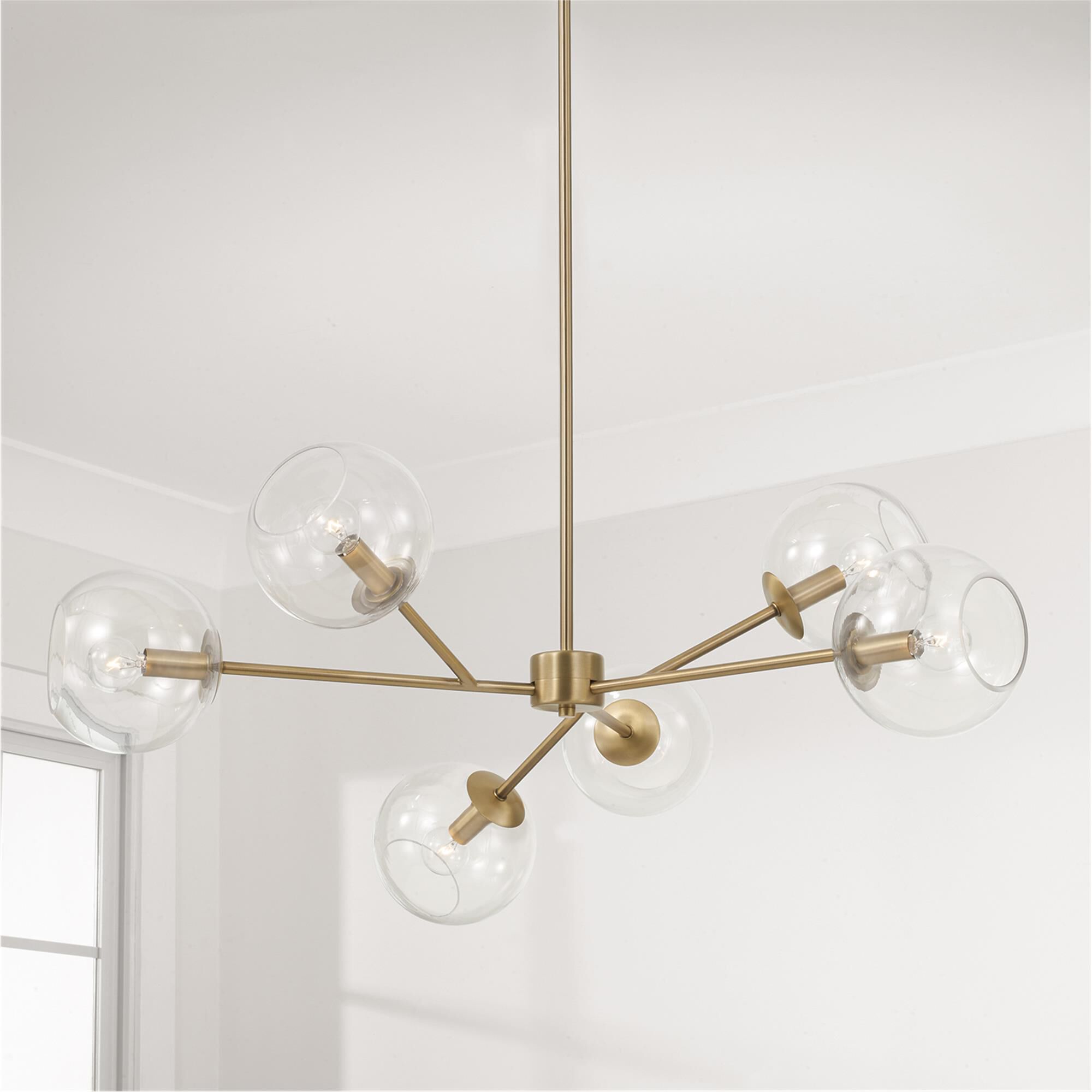 Shown in Aged Brass finish and Clear glass