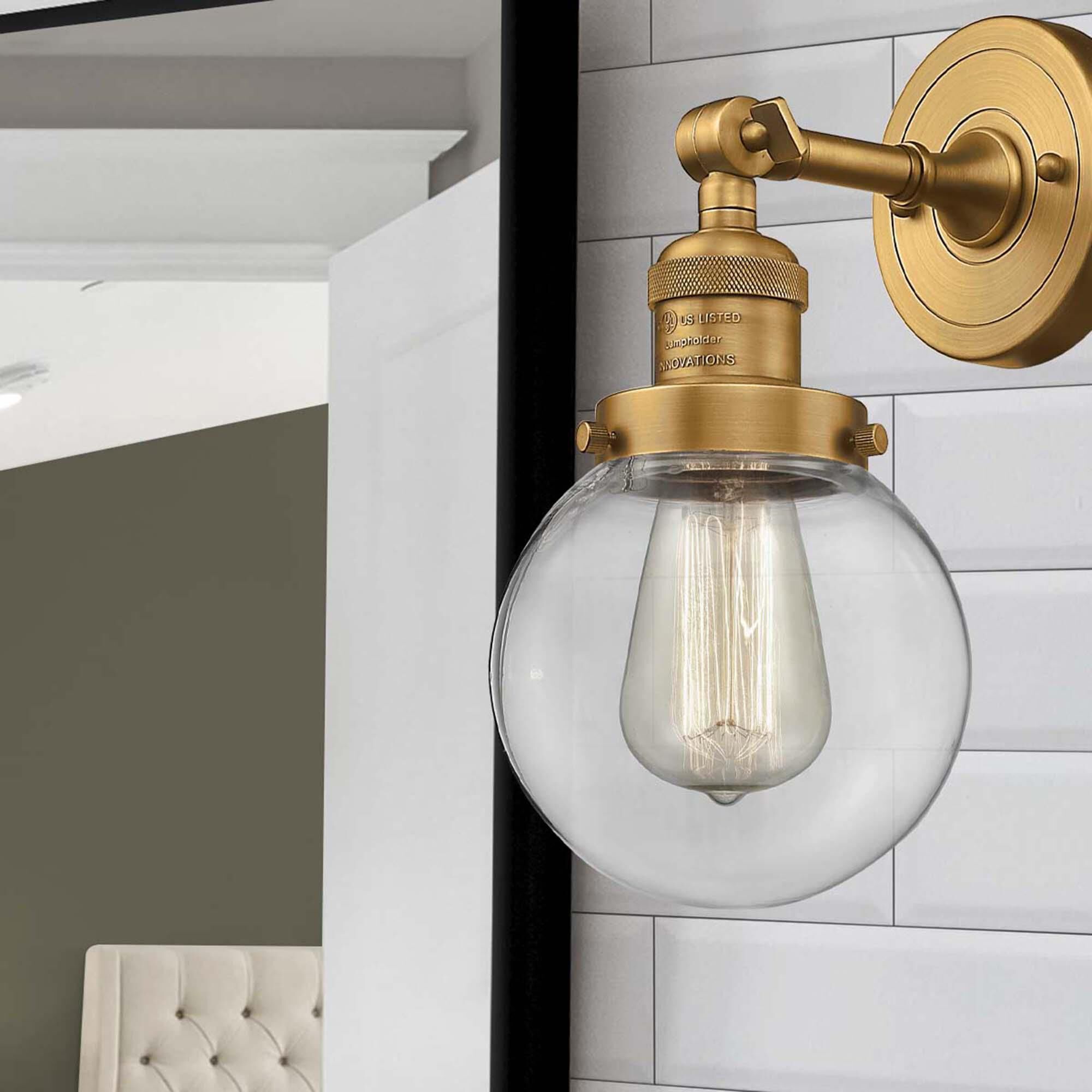 Shown in Brushed Brass finish and Clear glass and No Accent accent