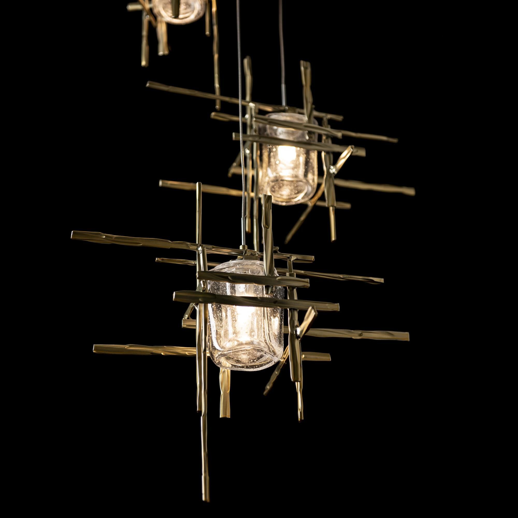 Shown in Modern Brass finish and Seeded Clear glass and Seeded Clear Glass shade