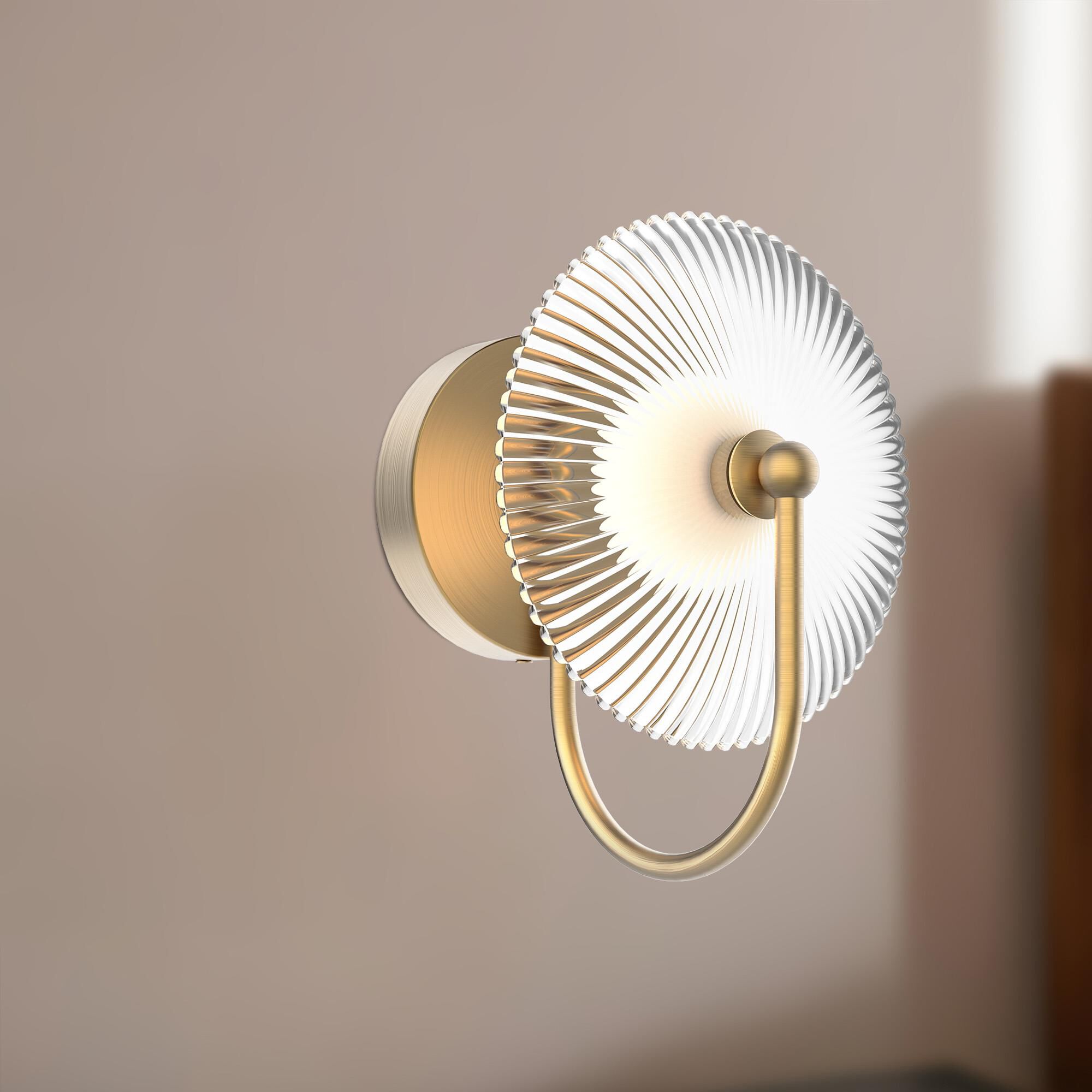 Shown in Brushed Gold finish and Clear Ribbed and Matte Opal Ball glass