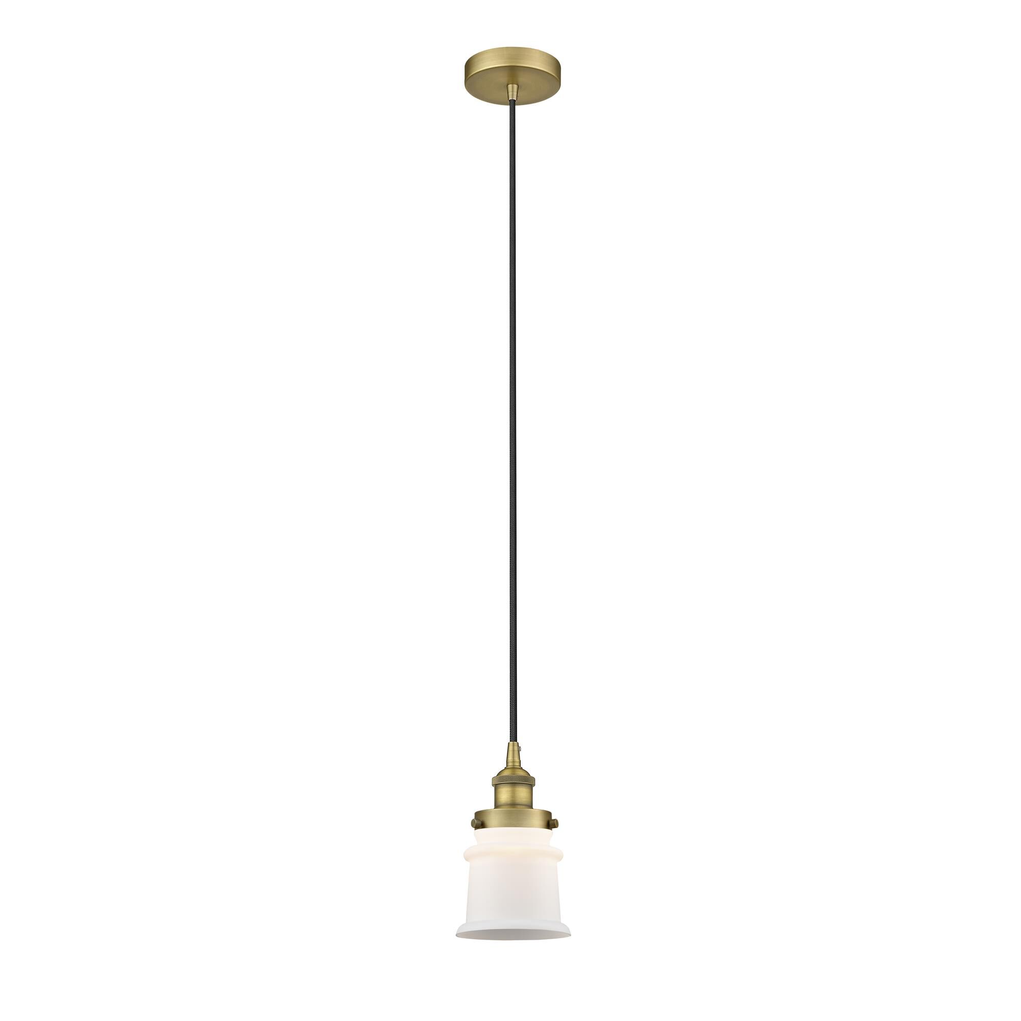 Shown in Brushed Brass finish and Matte White glass