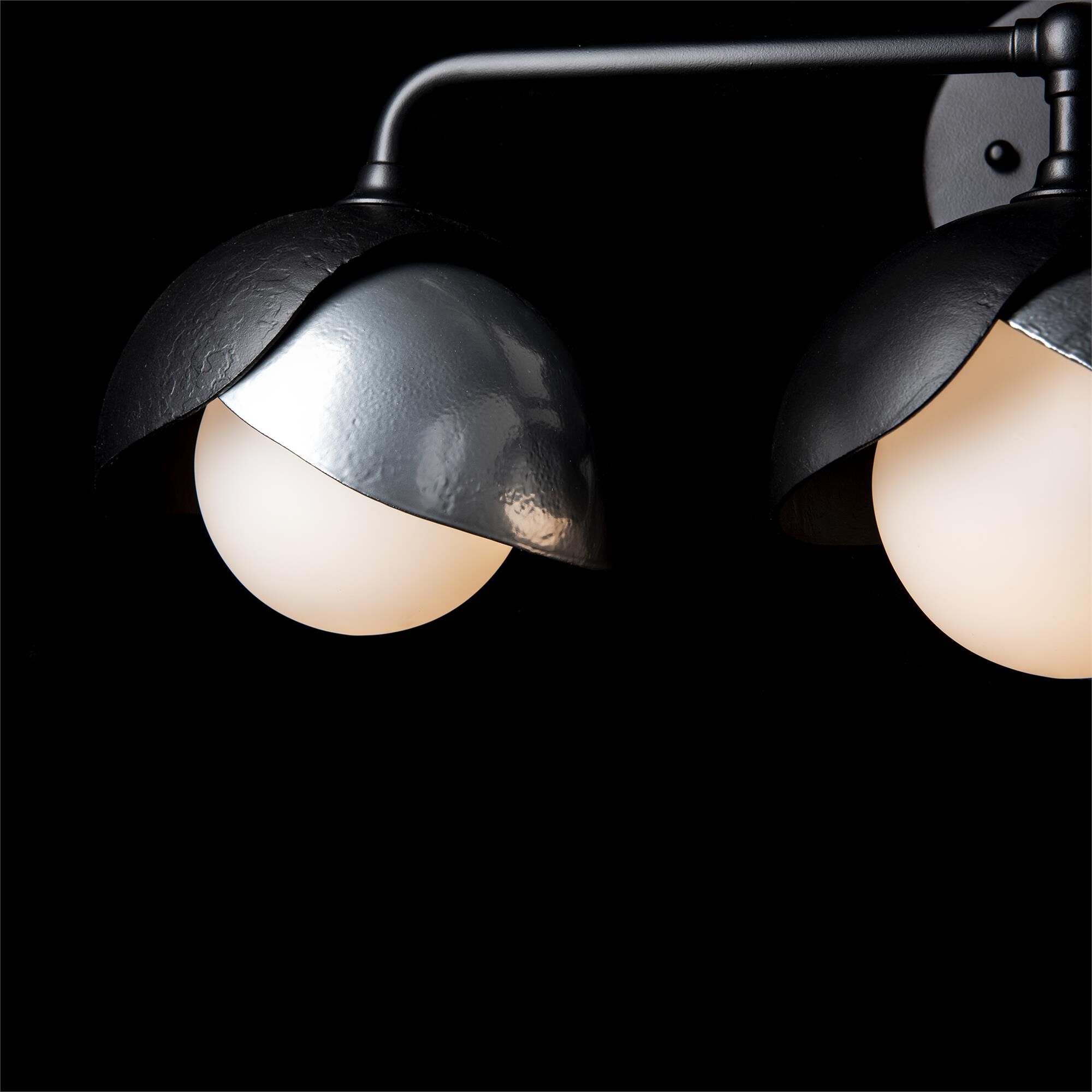 Shown in Black finish and Opal glass and Sterling accent