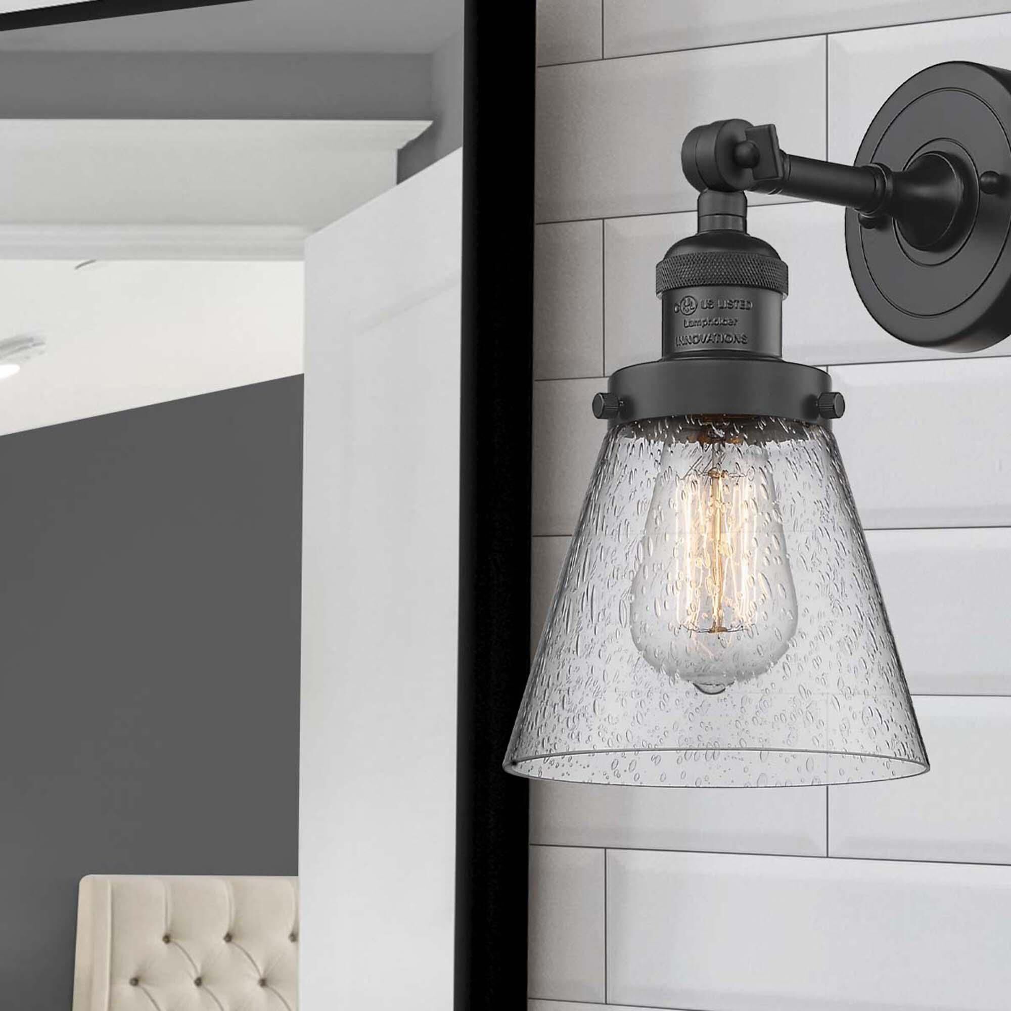 Shown in Matte Black finish and Seedy glass