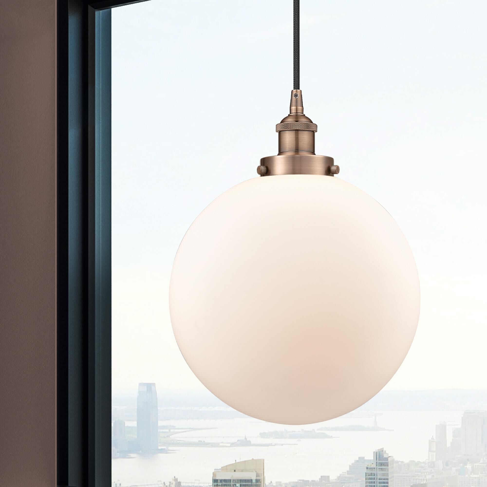 Shown in Antique Copper finish and Matte White Cased Beacon glass