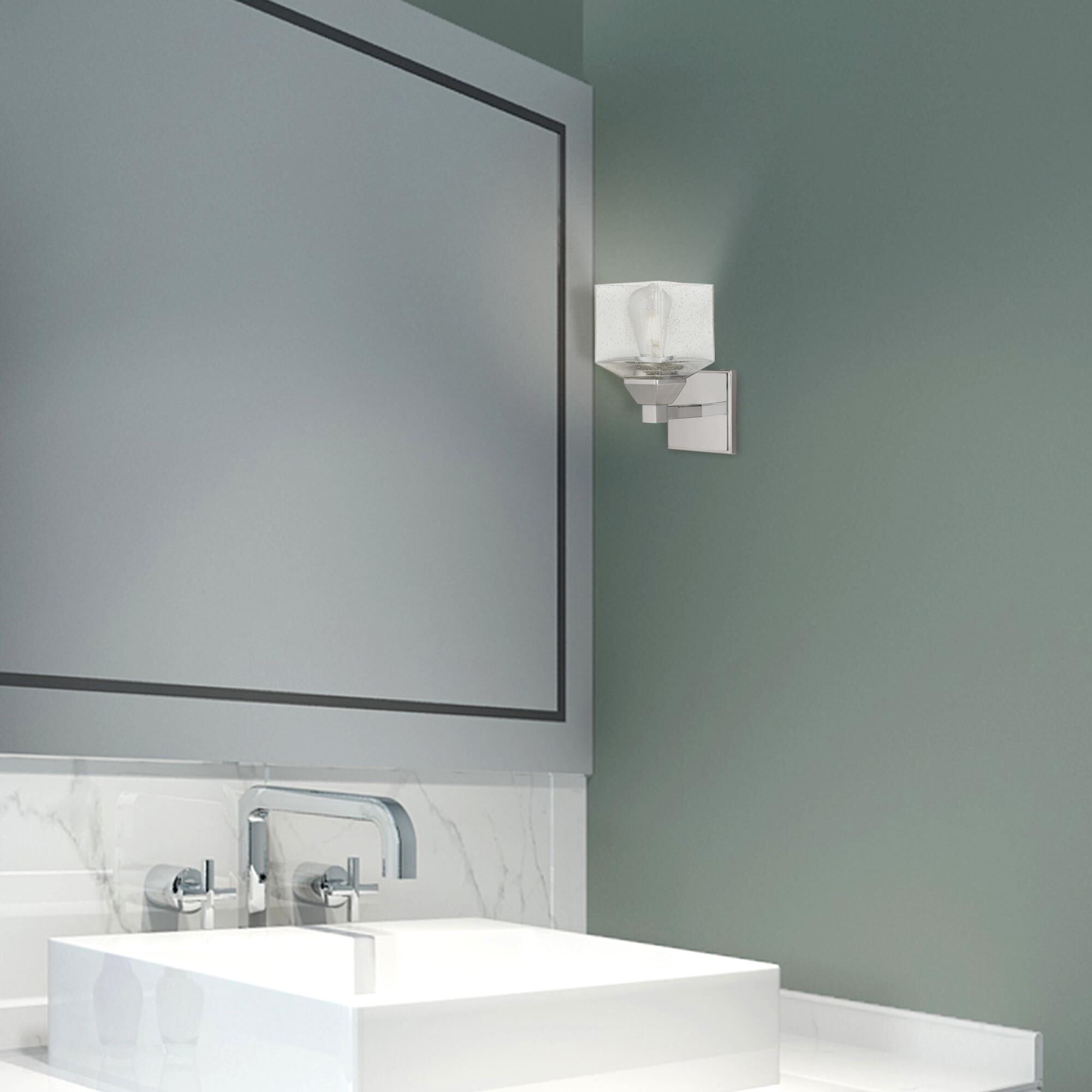 Shown in Polished Chrome finish and Hand Blown Clear Seeded glass