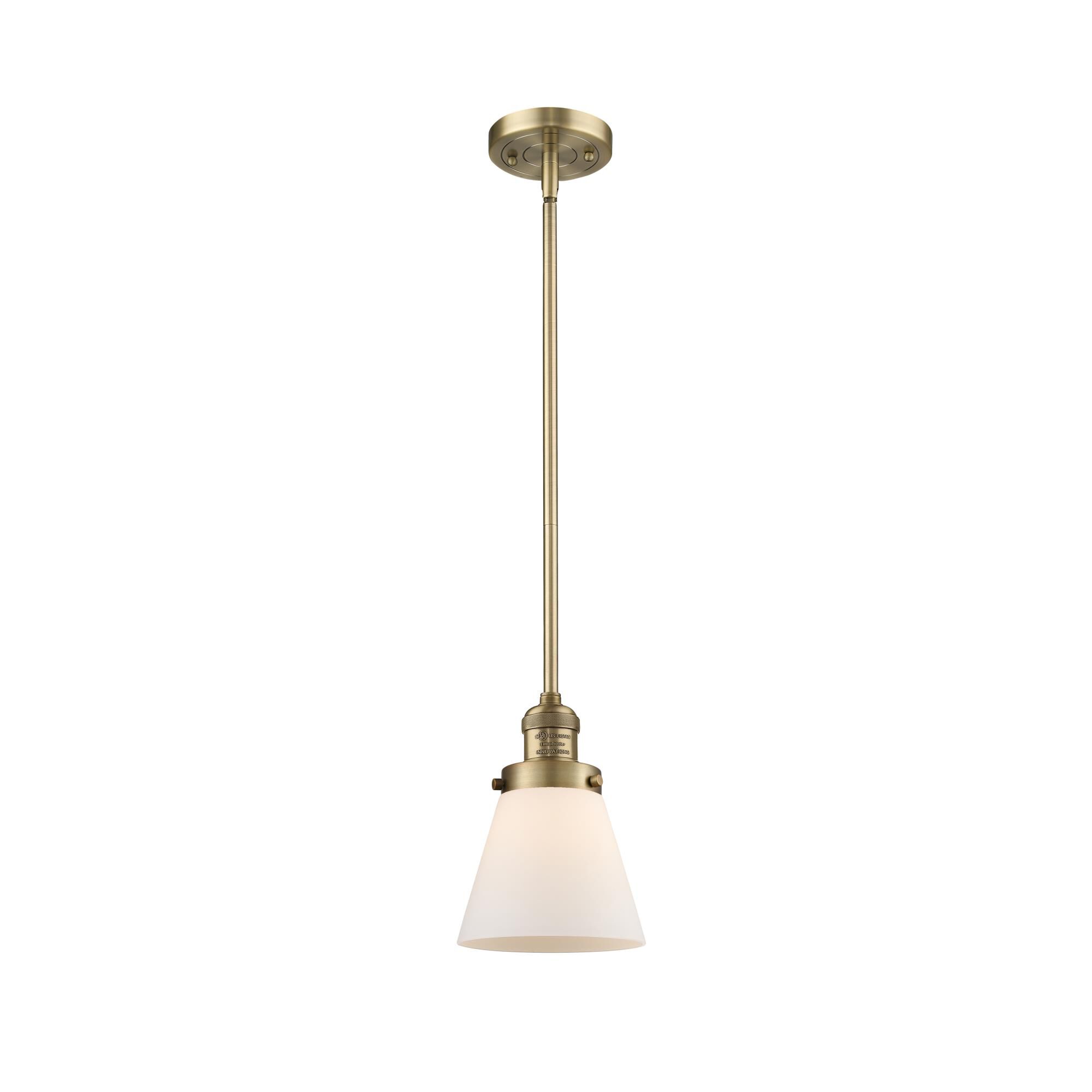 Shown in Brushed Brass finish and Matte White Cased glass