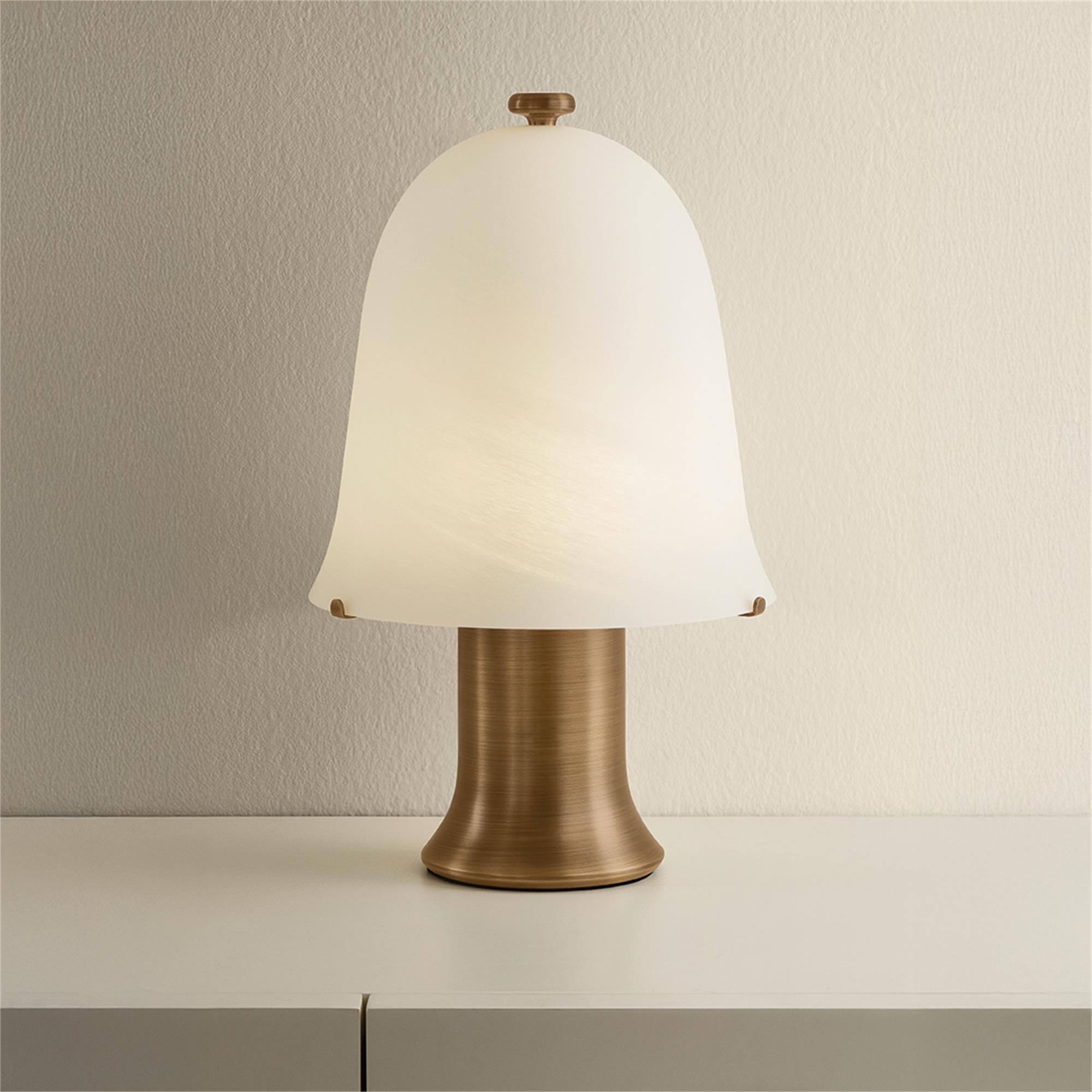 Shown in Patina Brass finish and Matte Cloud glass