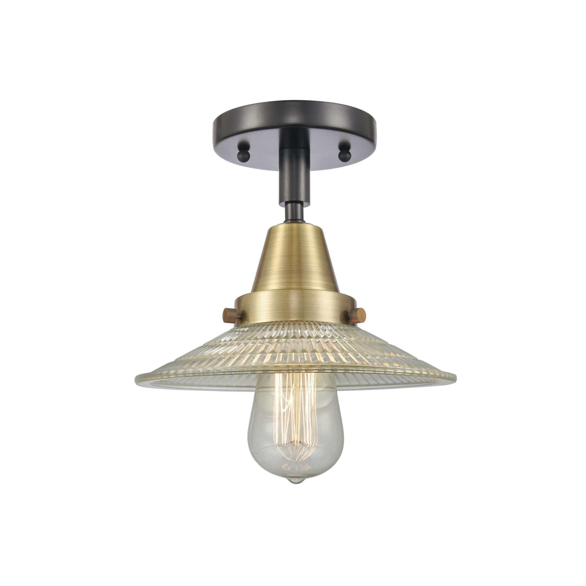 Shown in Black Antique Brass finish and Clear Halophane glass