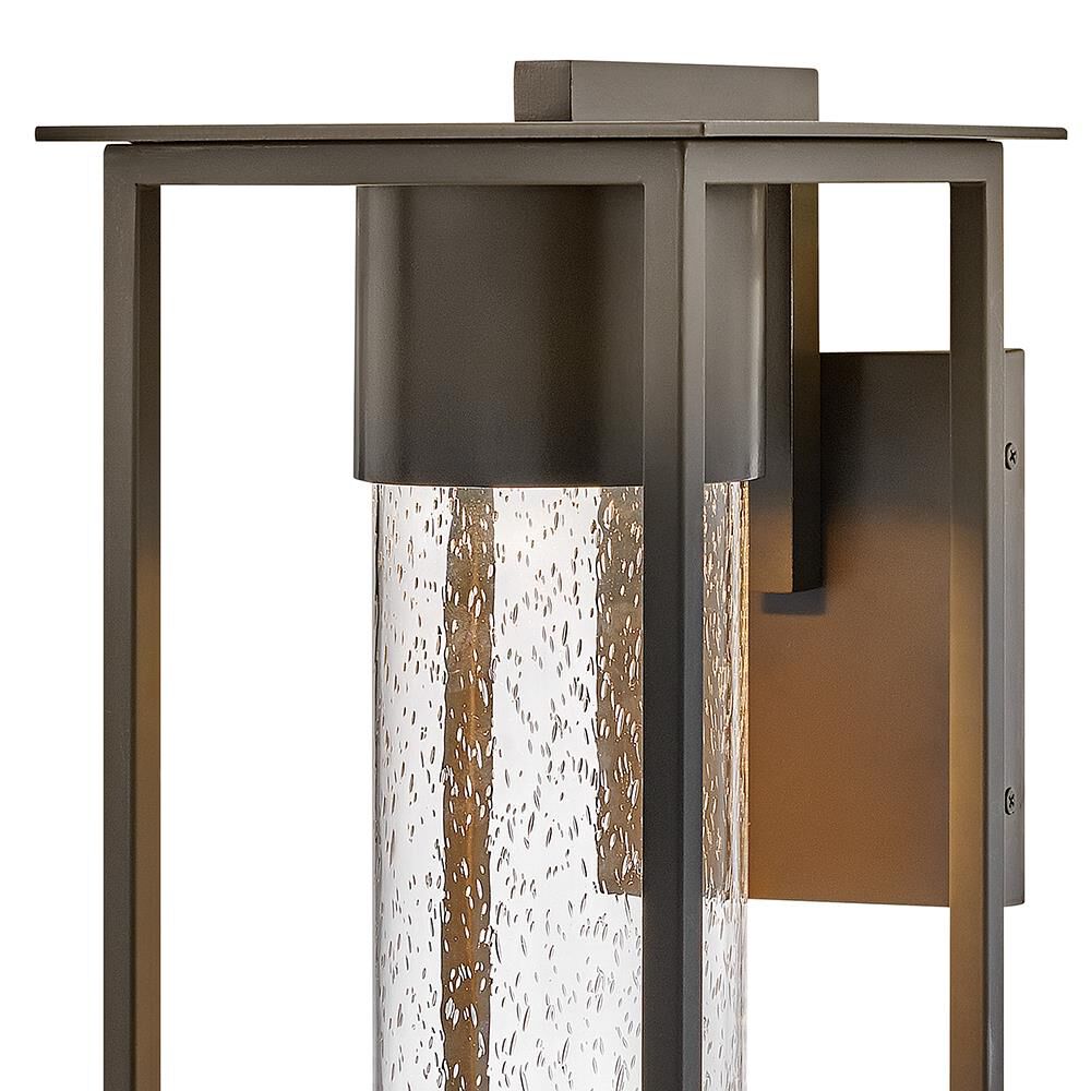 Shown in Oil Rubbed Bronze finish and Clear Seedy glass