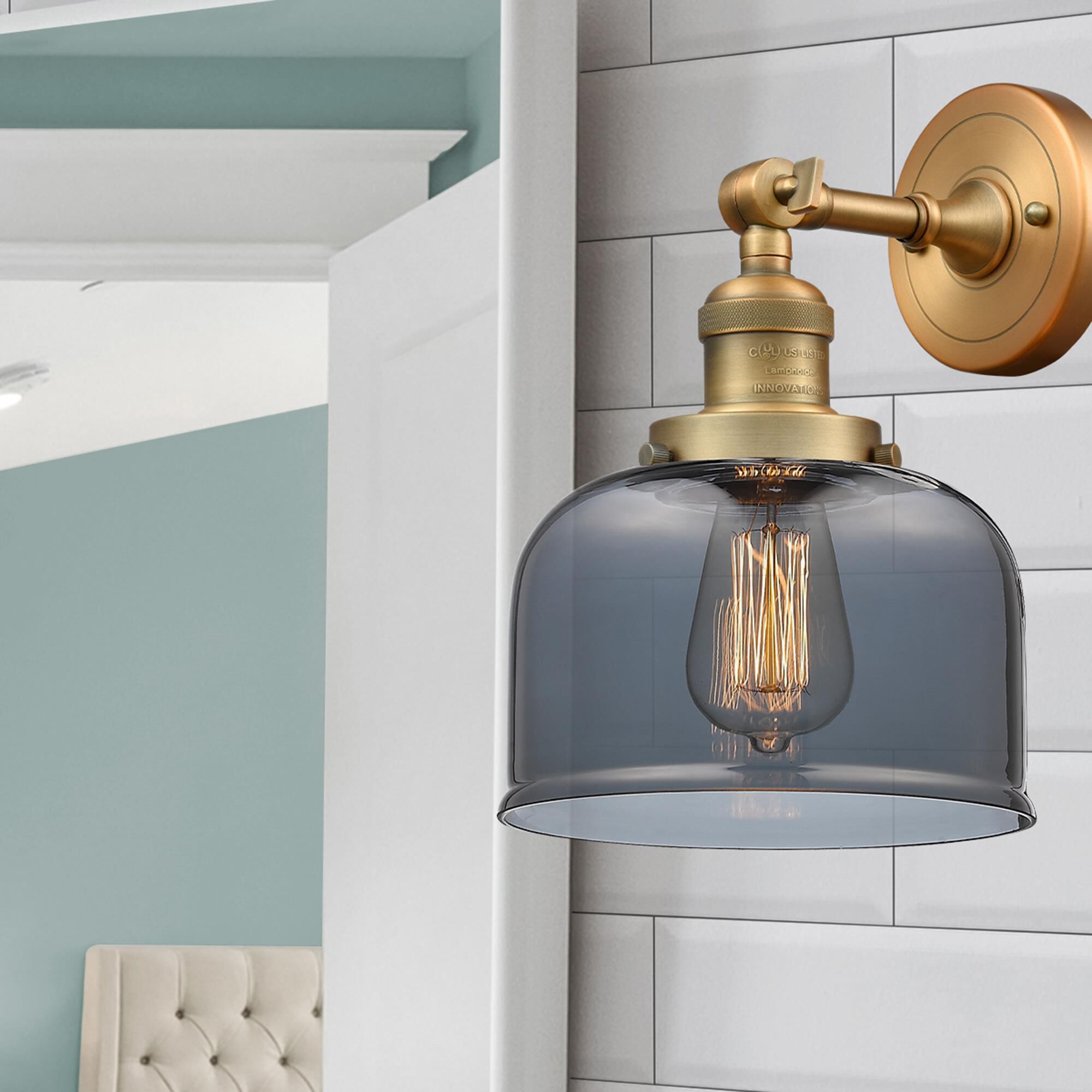 Shown in Brushed Brass finish and Plated Smoked glass