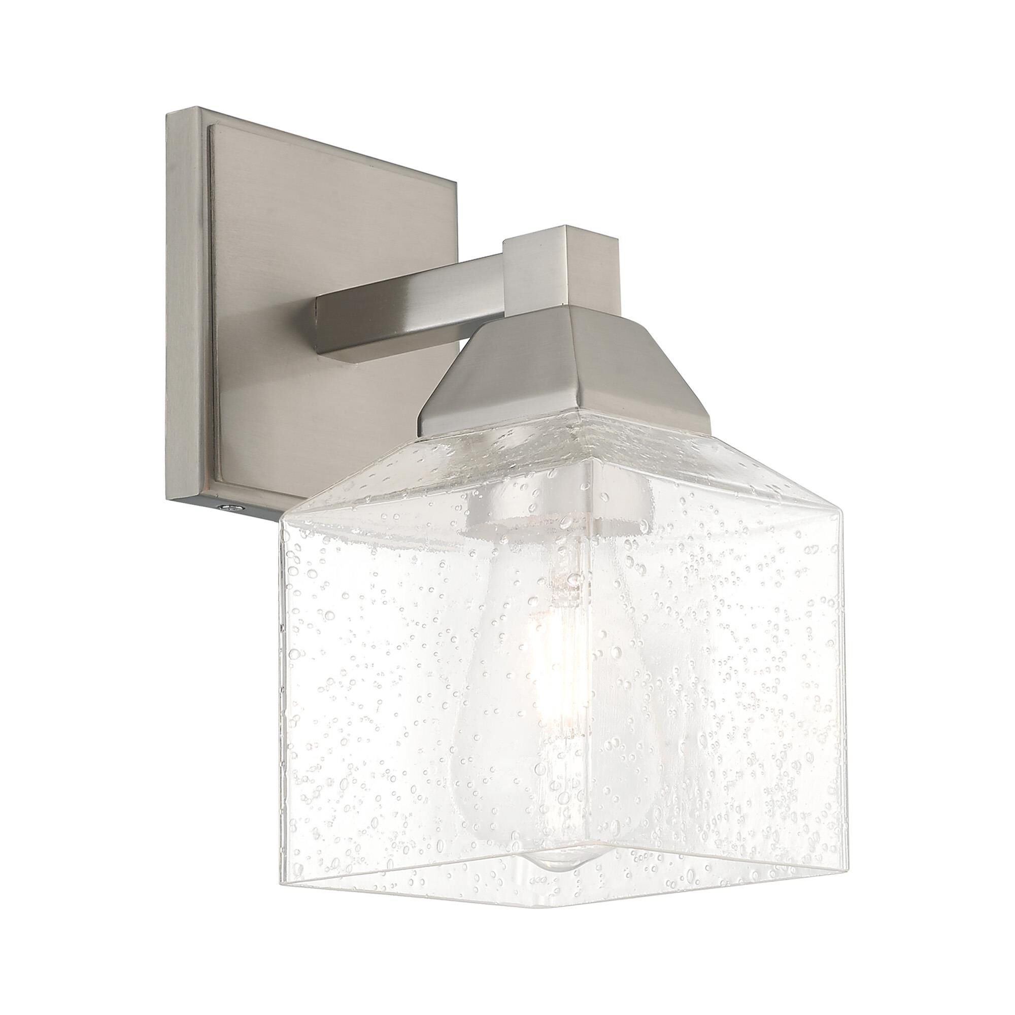 Shown in Brushed Nickel finish and Hand Blown Clear Seeded glass