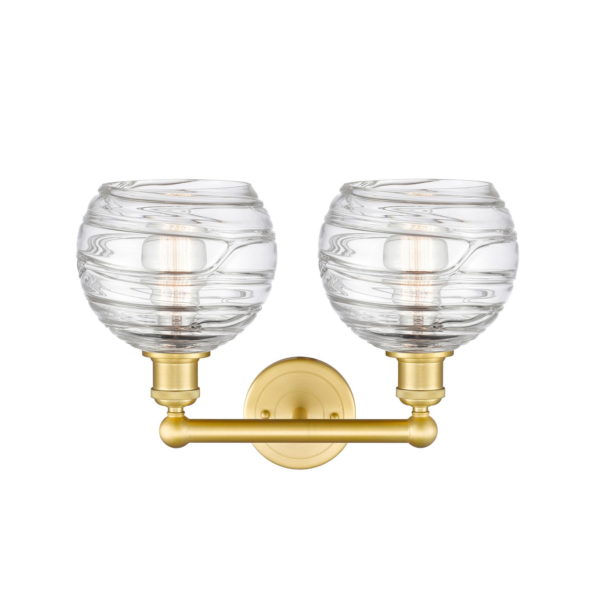 Shown in Satin Gold finish and Clear Deco Swirl glass